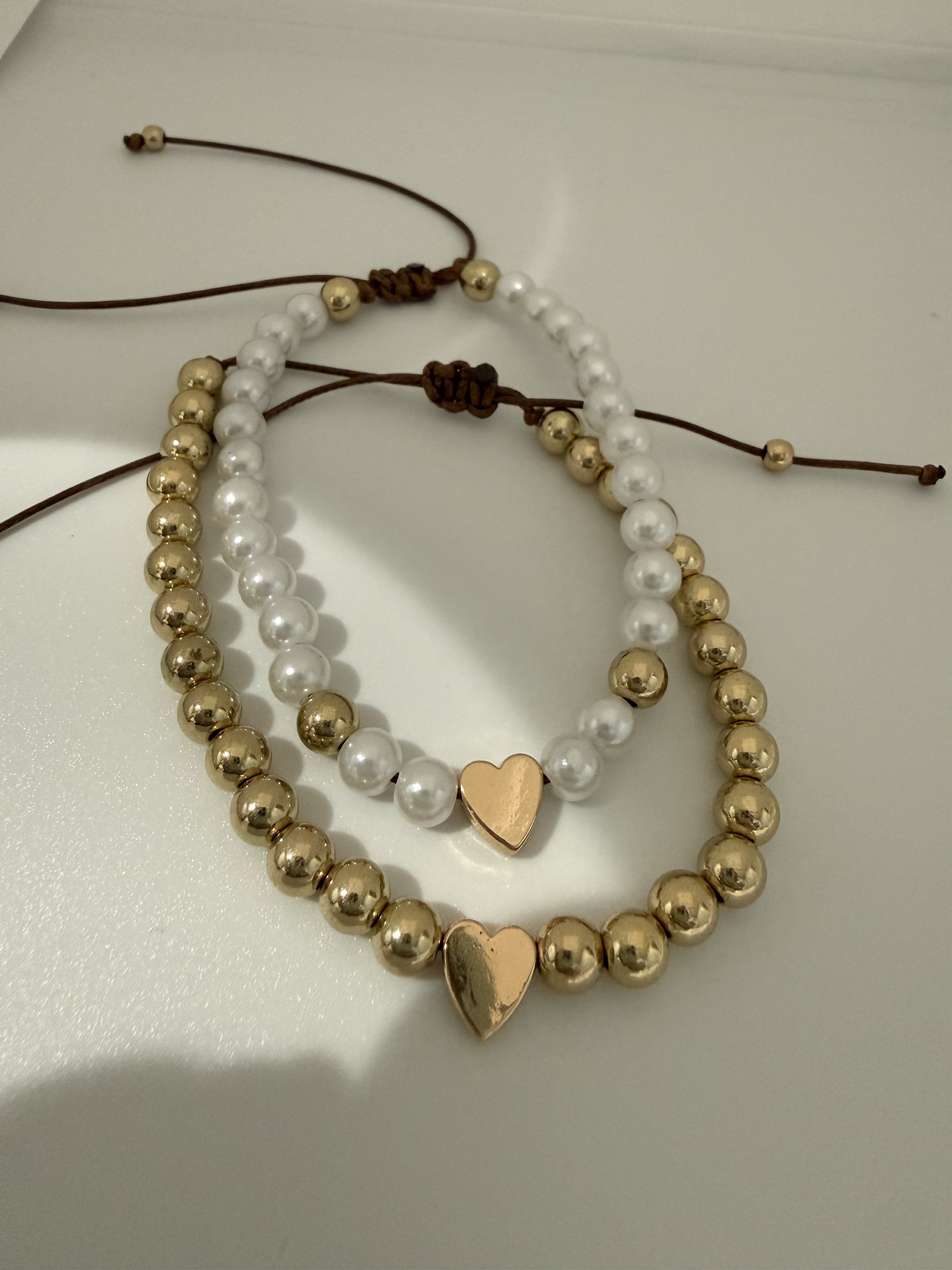 Set of two heart charm bracelets