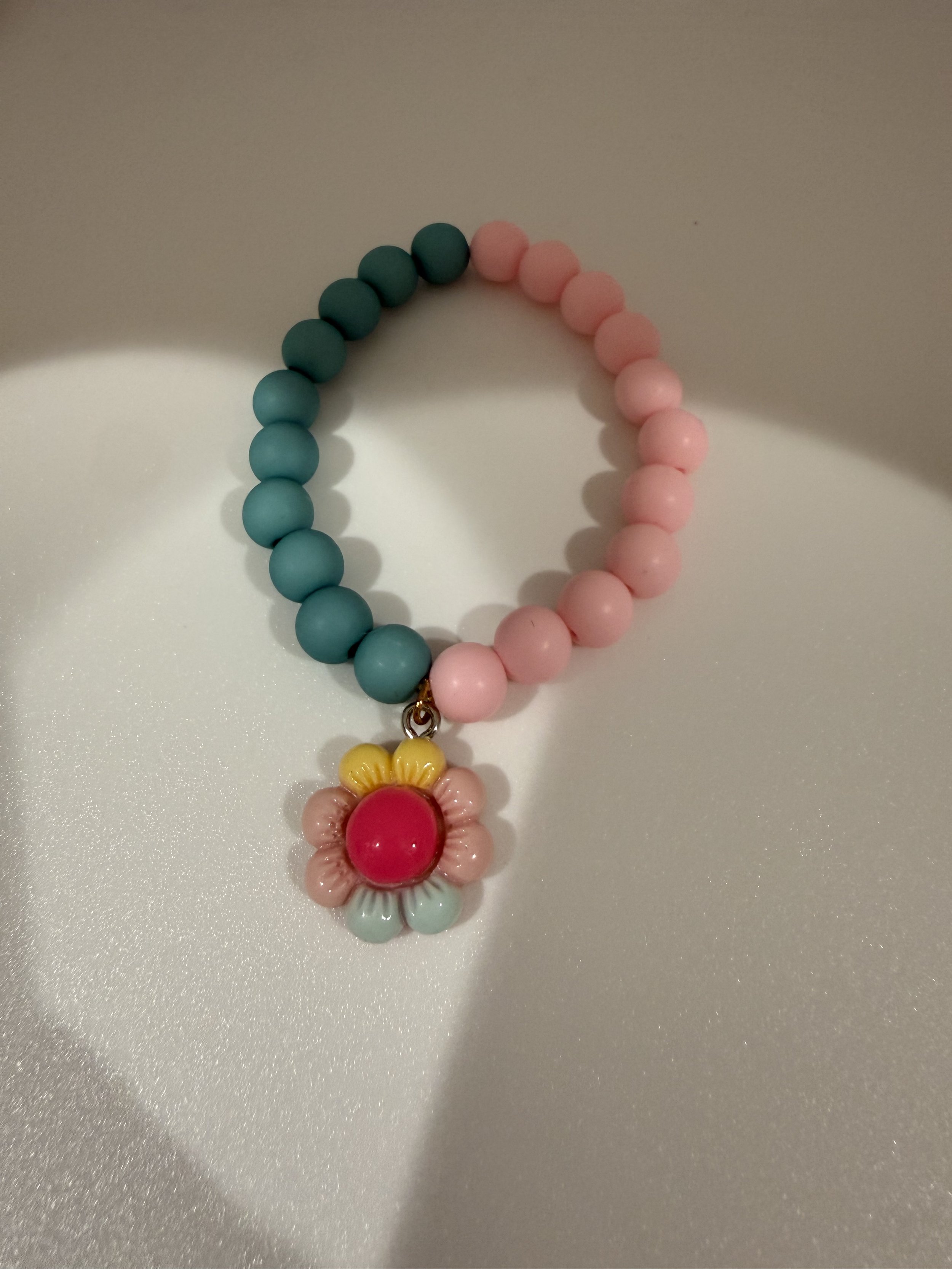 Turquoise and pink beaded flower bracelet