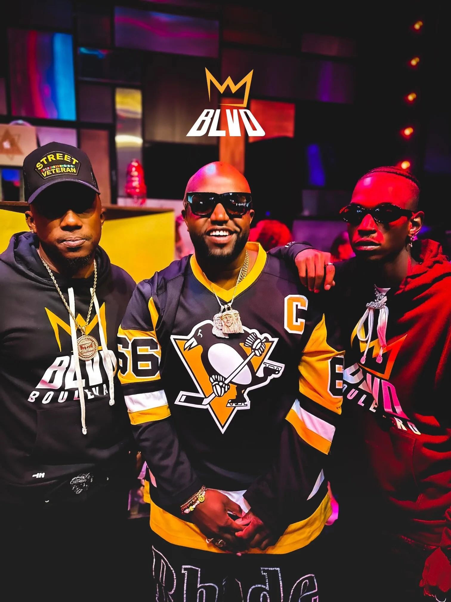 R&B music group performing artist development project, wearing coordinated BLVD apparel, representing independent artist growth and creative direction.