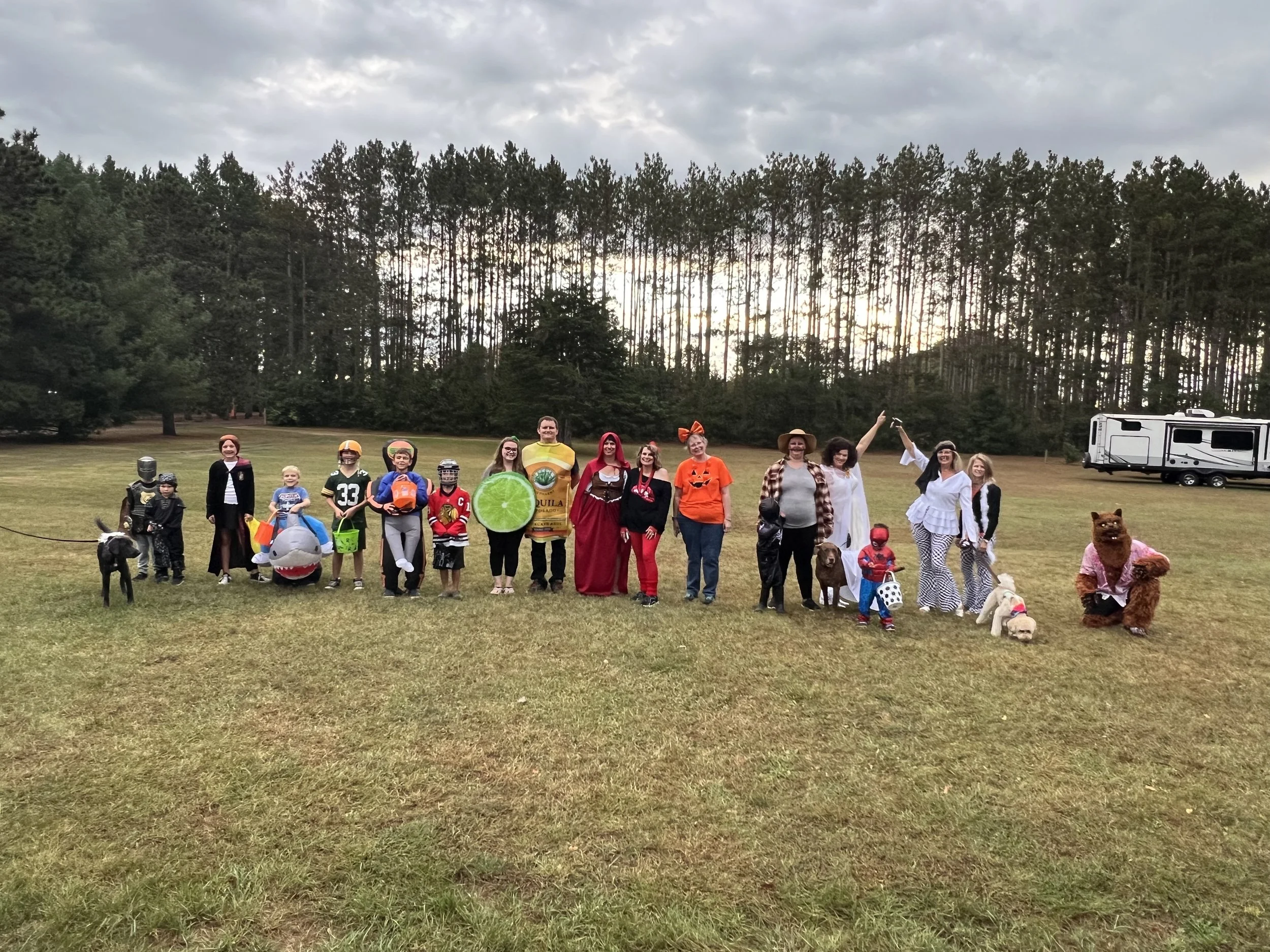 Group posing in Halloween costumes