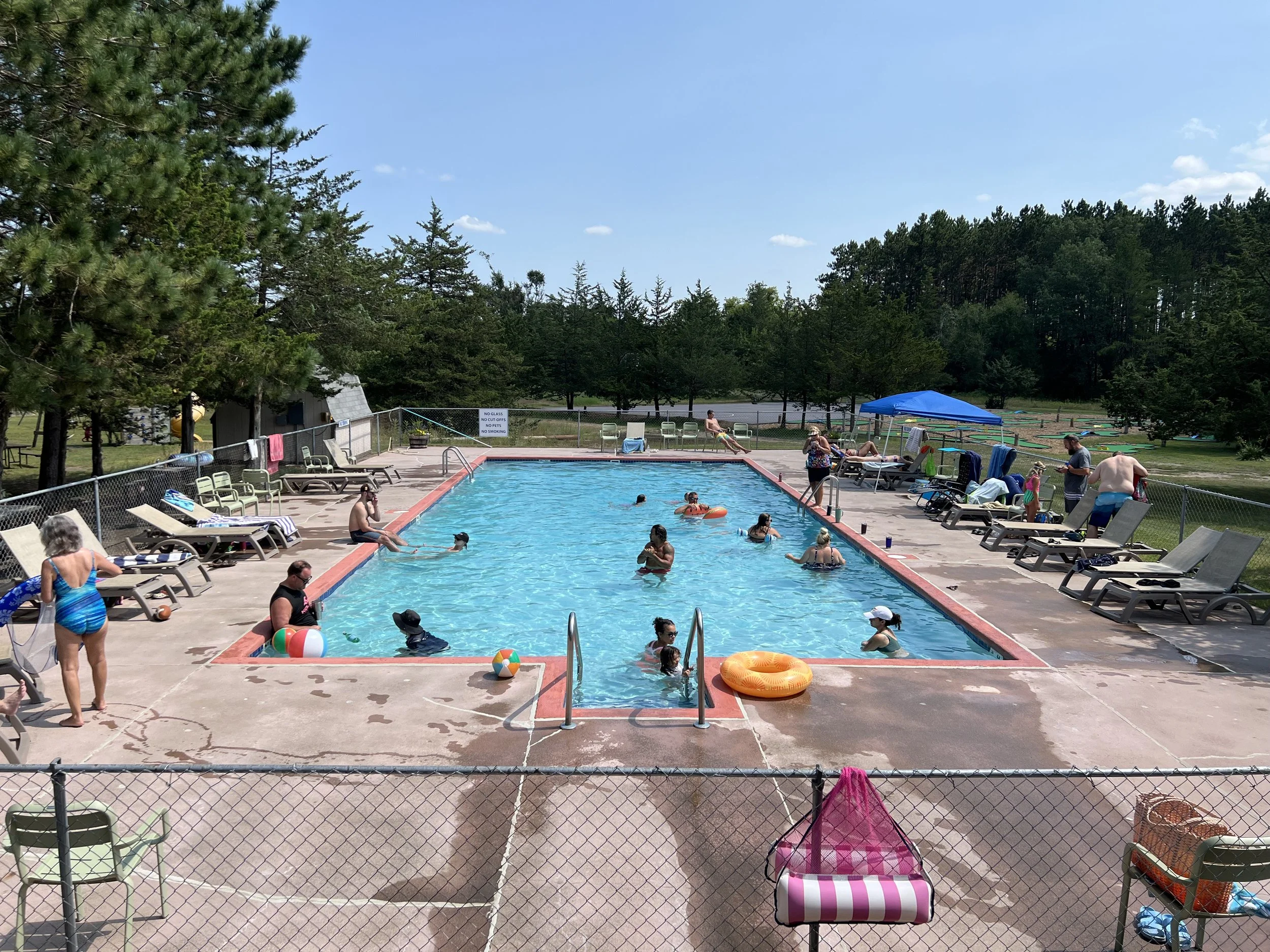 people swimming in heated pool at Dell Pines Campground