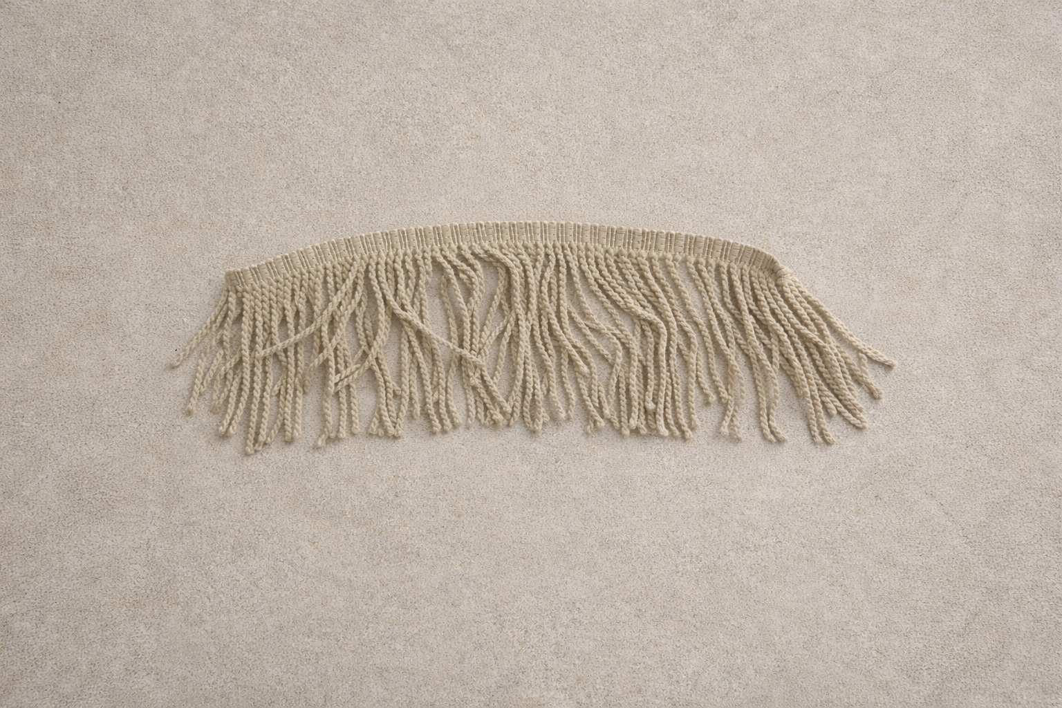 close up of Neutral matte dune fringe