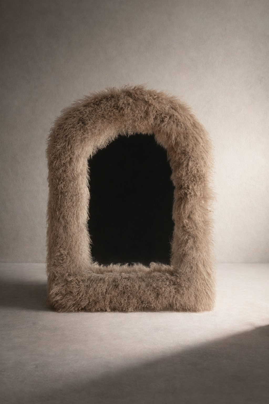 Mongolian Lamb Fur Arched Mirror – front view, soft textured fur frame, collectible wall mirror by Amber Renee Hansen.