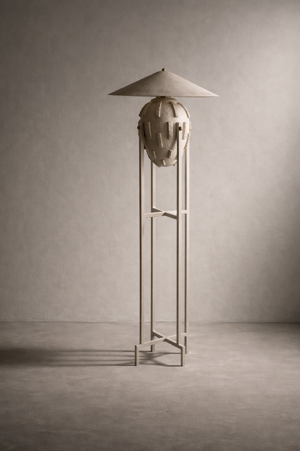 Amphora Floor Lamp from the Elongated Collection — sculptural floor lamp with textured vessel base, metal shade, and minimalist stand.