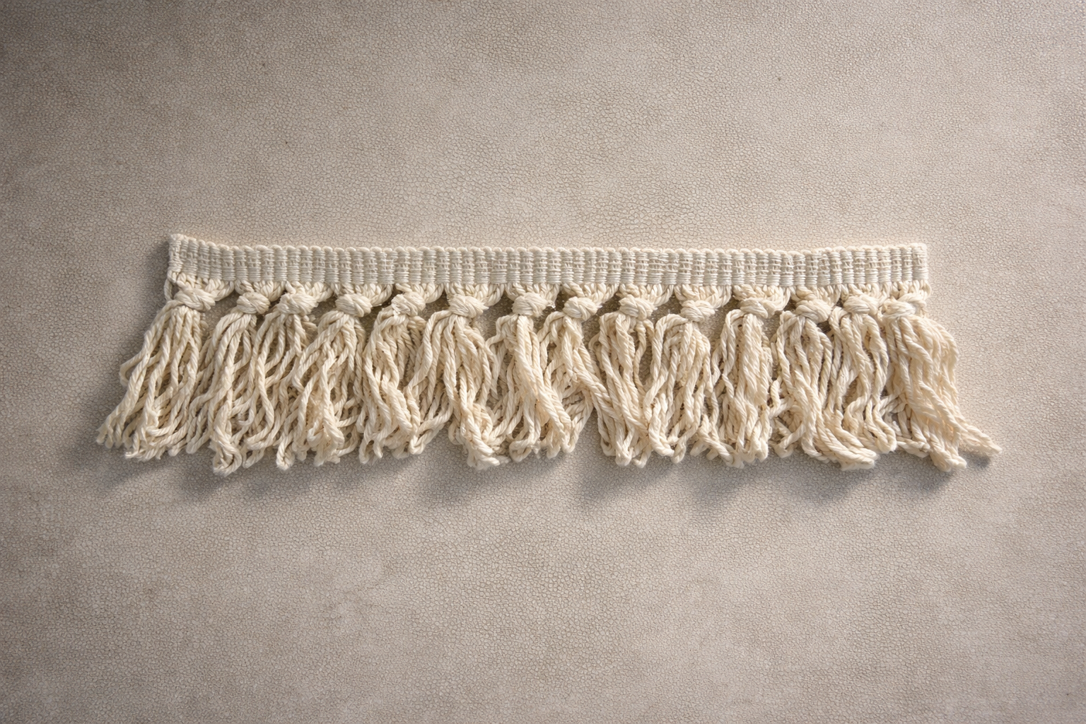 Cream cotton loop fringe tissue box cover by Amber Renee Hansen, handmade sculptural home object in soft neutral tone