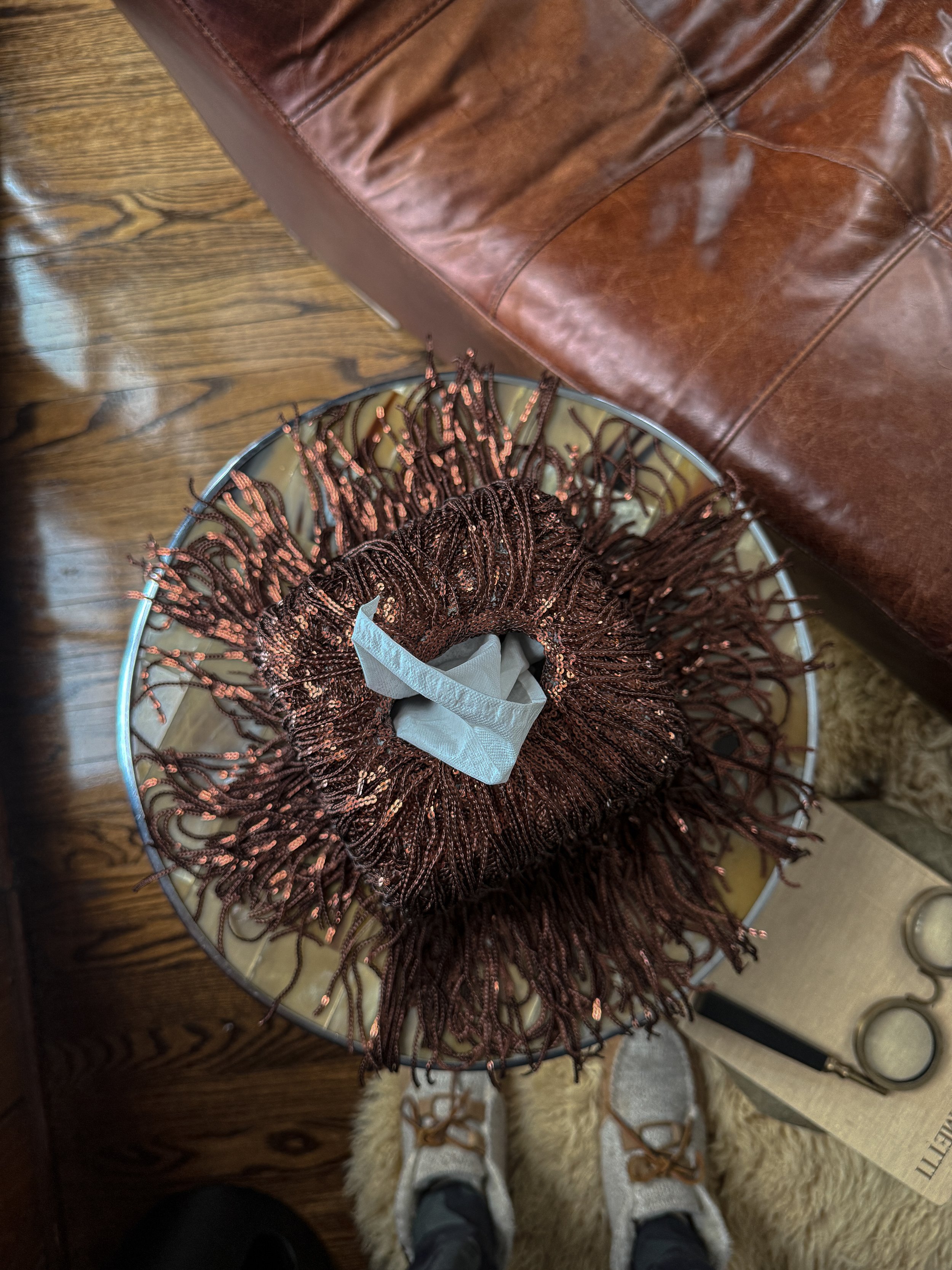 11:59 Limited Edition fringe tissue box cover in Last Call, featuring deep metallic bronze fringe with a sculptural drape