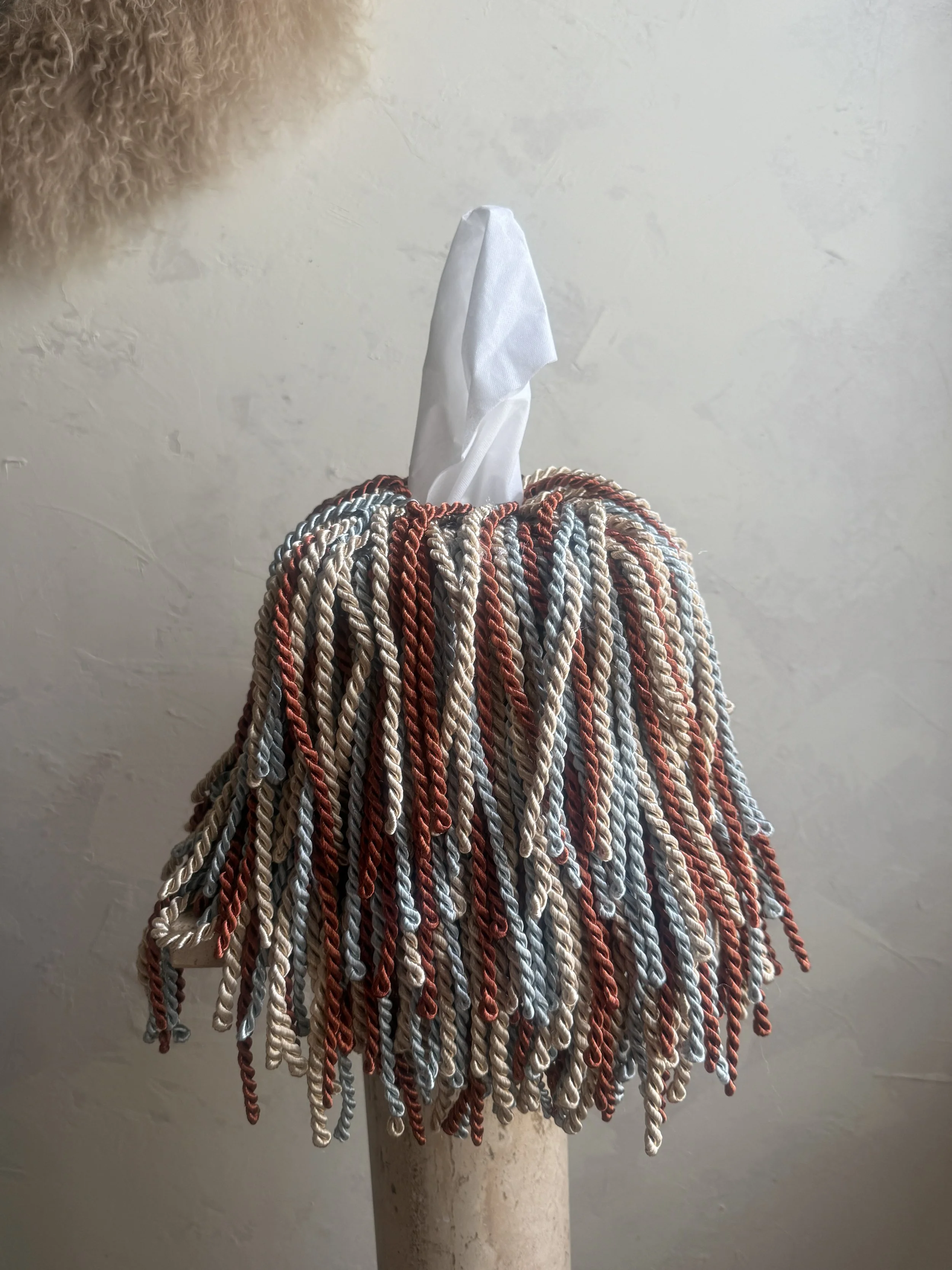 Canyon Sky fringe tissue box cover in cayenne, soft blue, and cream tones with layered fringe texture