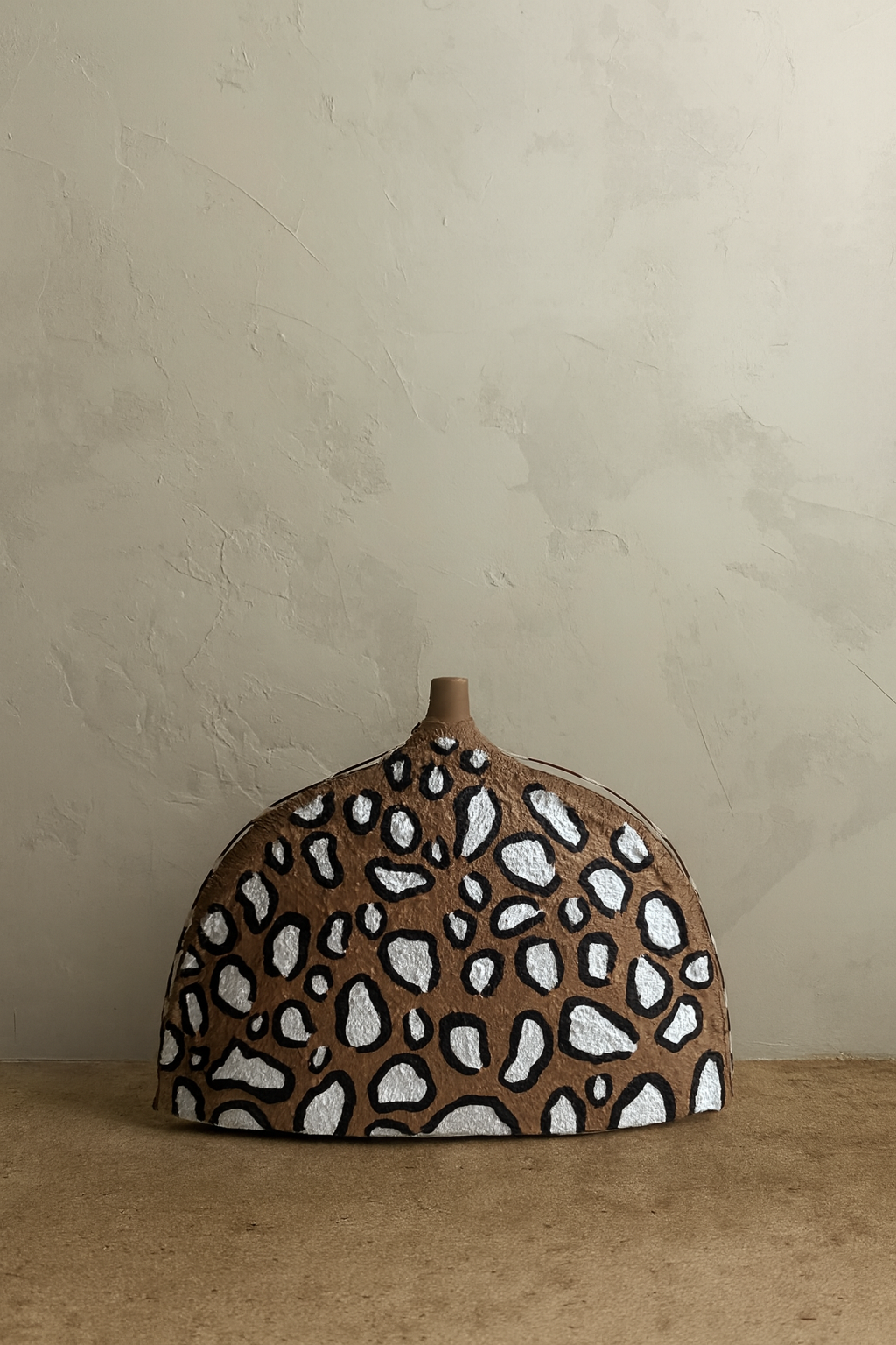 Fringe Discipline vessel by Amber Renee Hansen — cement-coated ceramic form with embedded fringe and porcupine quills, part of the Untamed Collection.