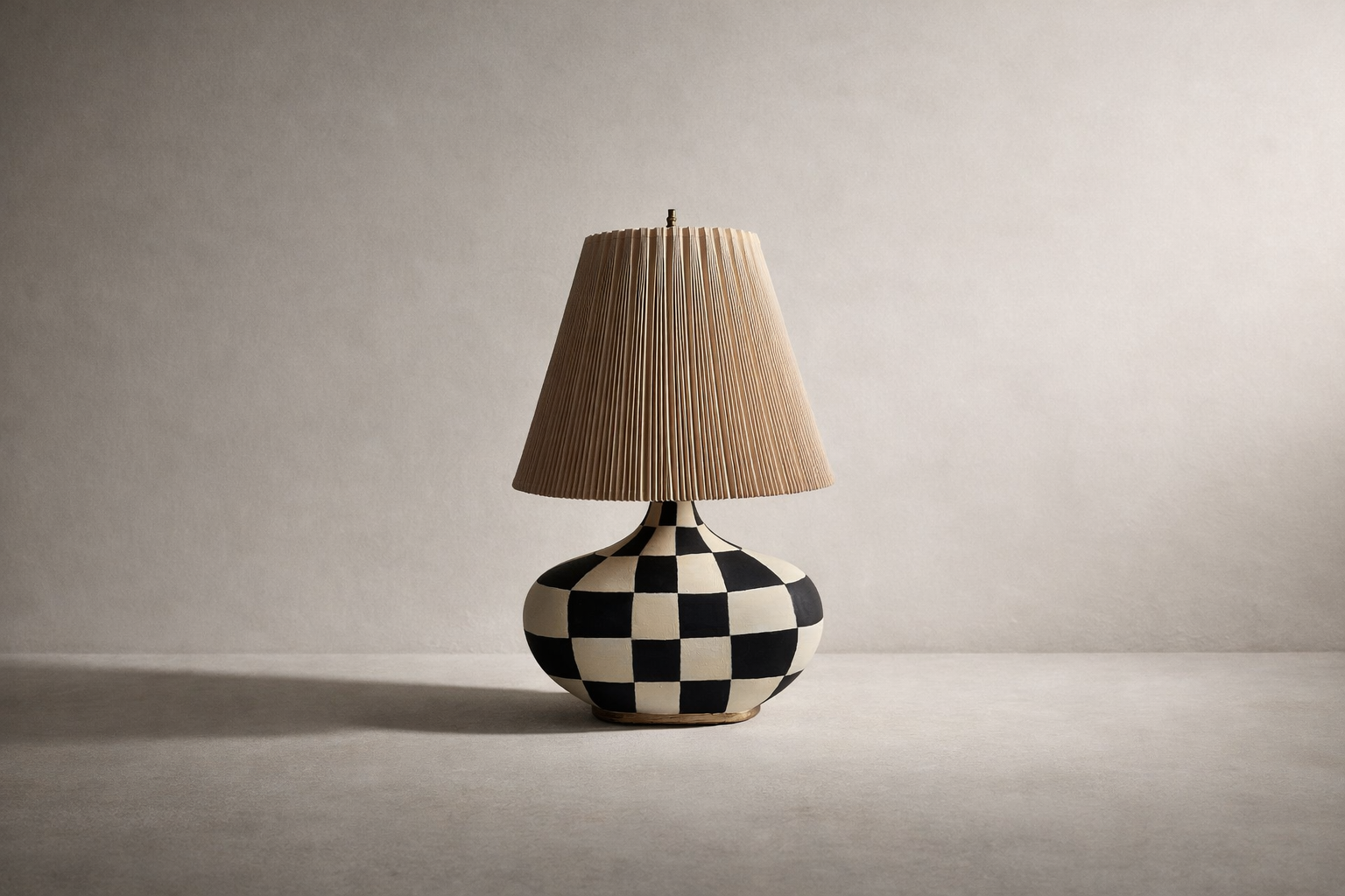 close up of checker pattern on designer table lamp