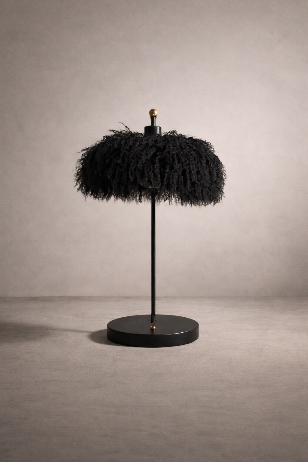 Close-up of black Mongolian lamb sheepskin texture on table lamp shade