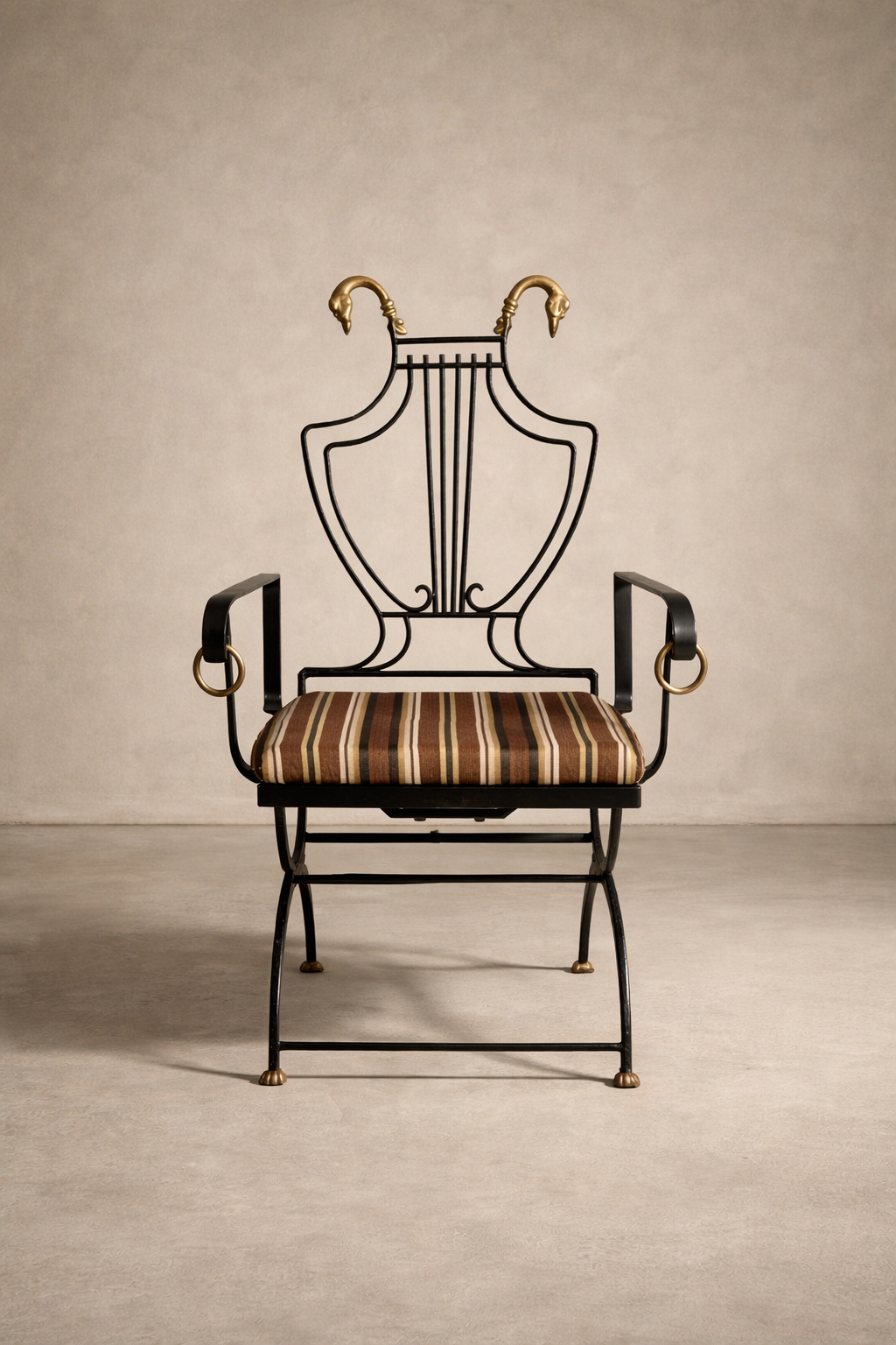 Vintage 1950s wrought iron lyre chair with brass swan heads and reupholstered striped seat