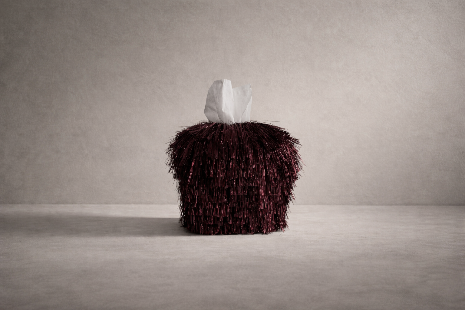 Burgundy Static tinsel fringe tissue box cover with metallic texture and sculptural surface