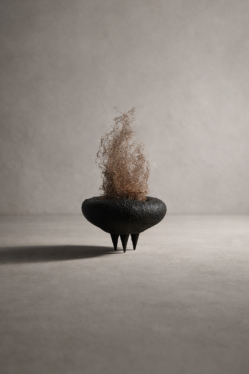 GQ Vanguard spiked masculine sculptural vessel décor