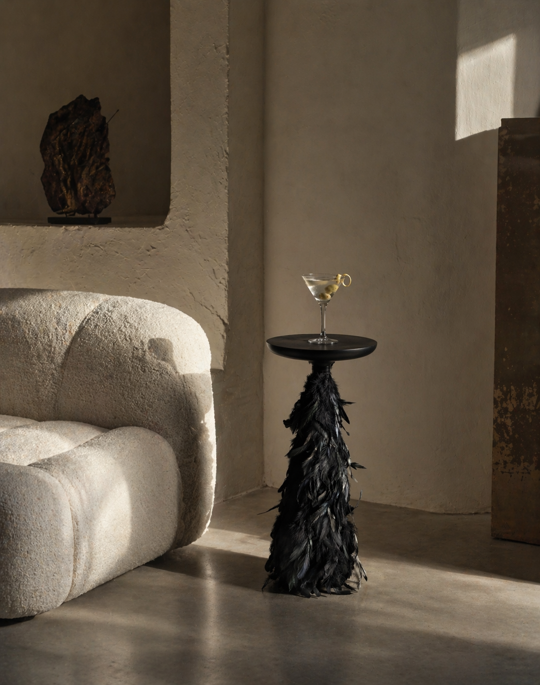 Black feather wrapped drink table with round top holding a martini glass, 24 inches tall, 10 inch diameter — Plume Drink Table