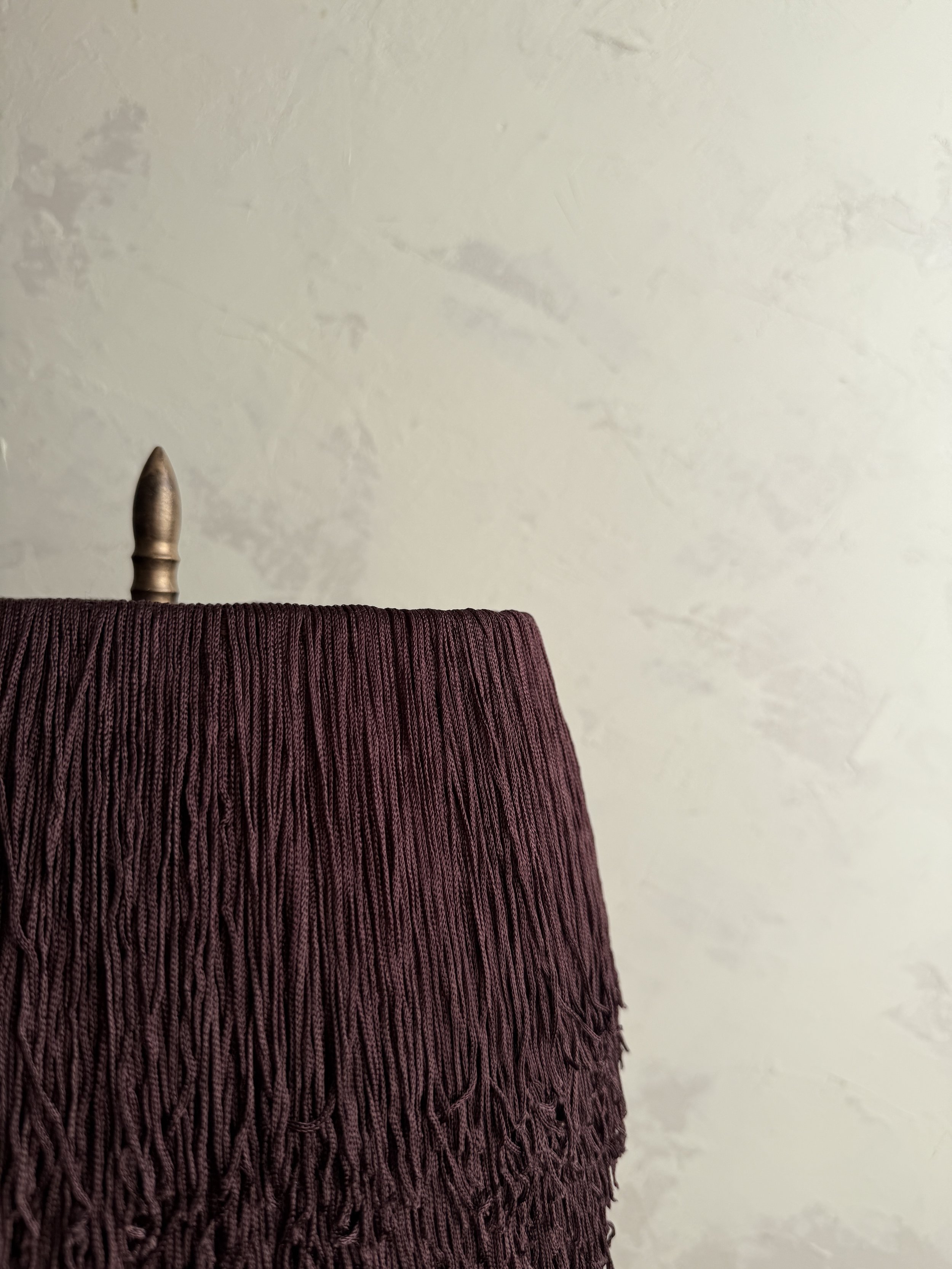 Close-up of Bordeaux Noir fringe texture