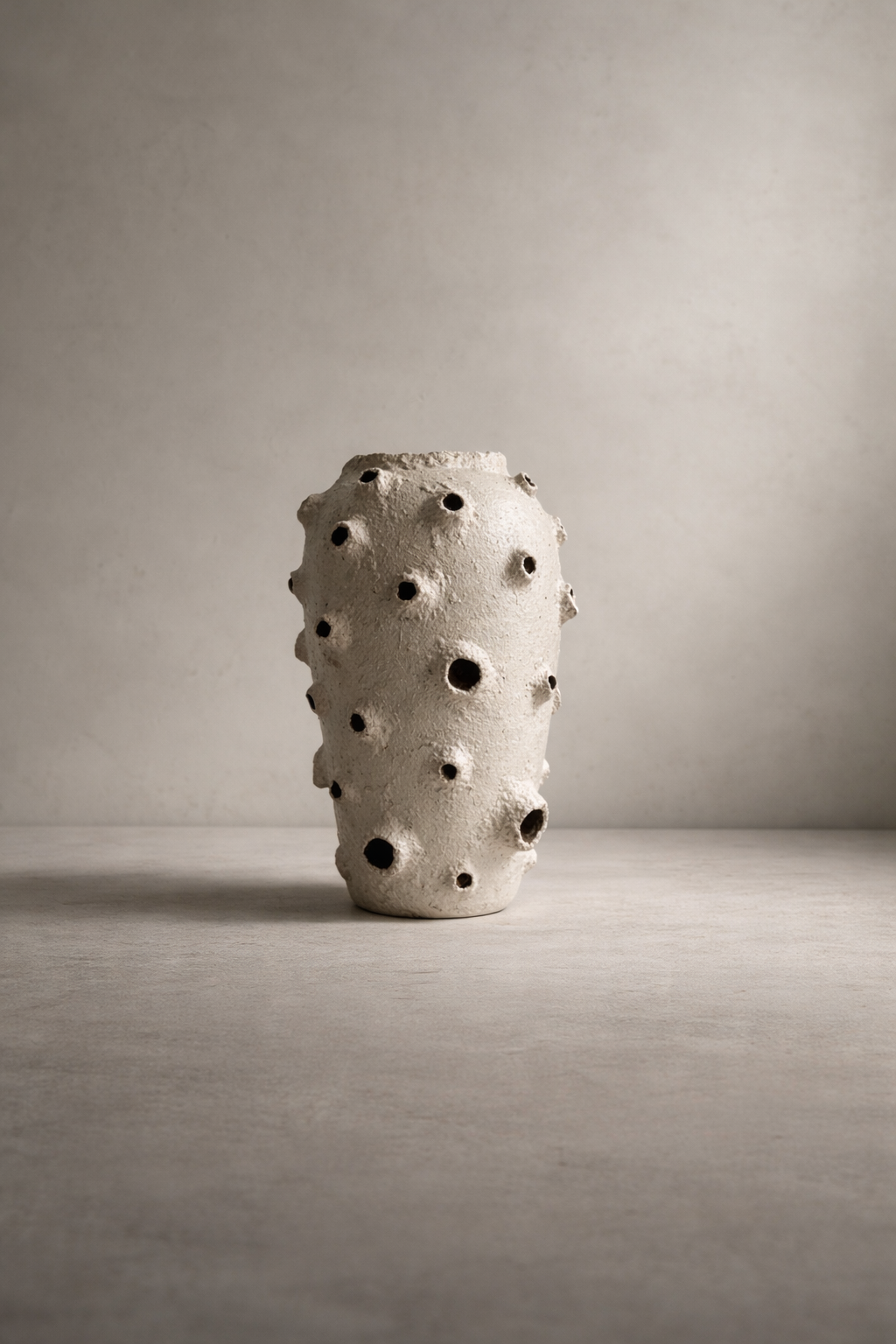 Lunar Terrain Vessel with cratered moon-inspired texture, displayed on a shelf.