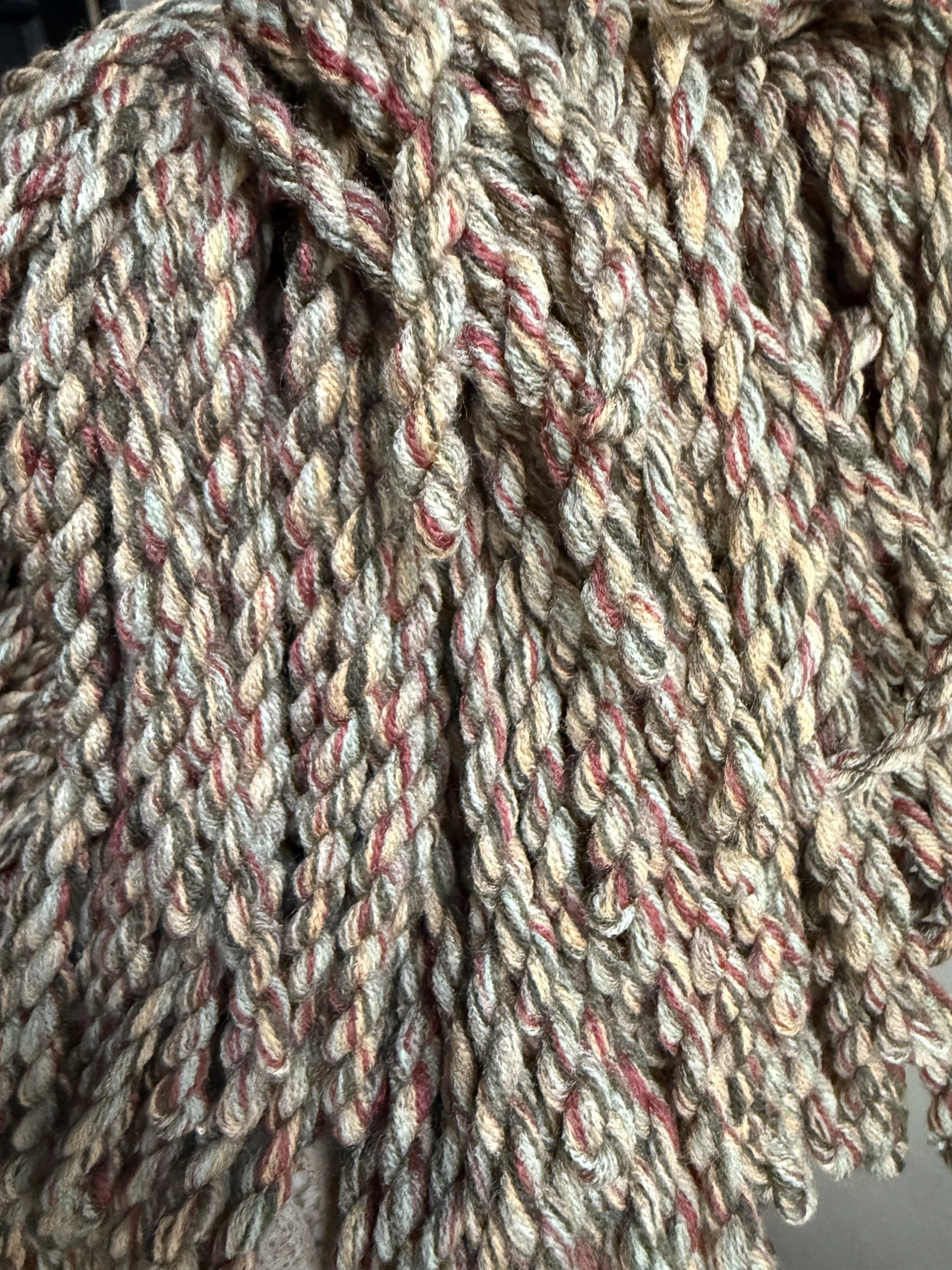 Meadow Knit Blend fringe tissue box cover wrapped in a green, merlot, sky-blue, and cream yarn blend — sculptural, textural, and handmade by Amber Renee Hansen.