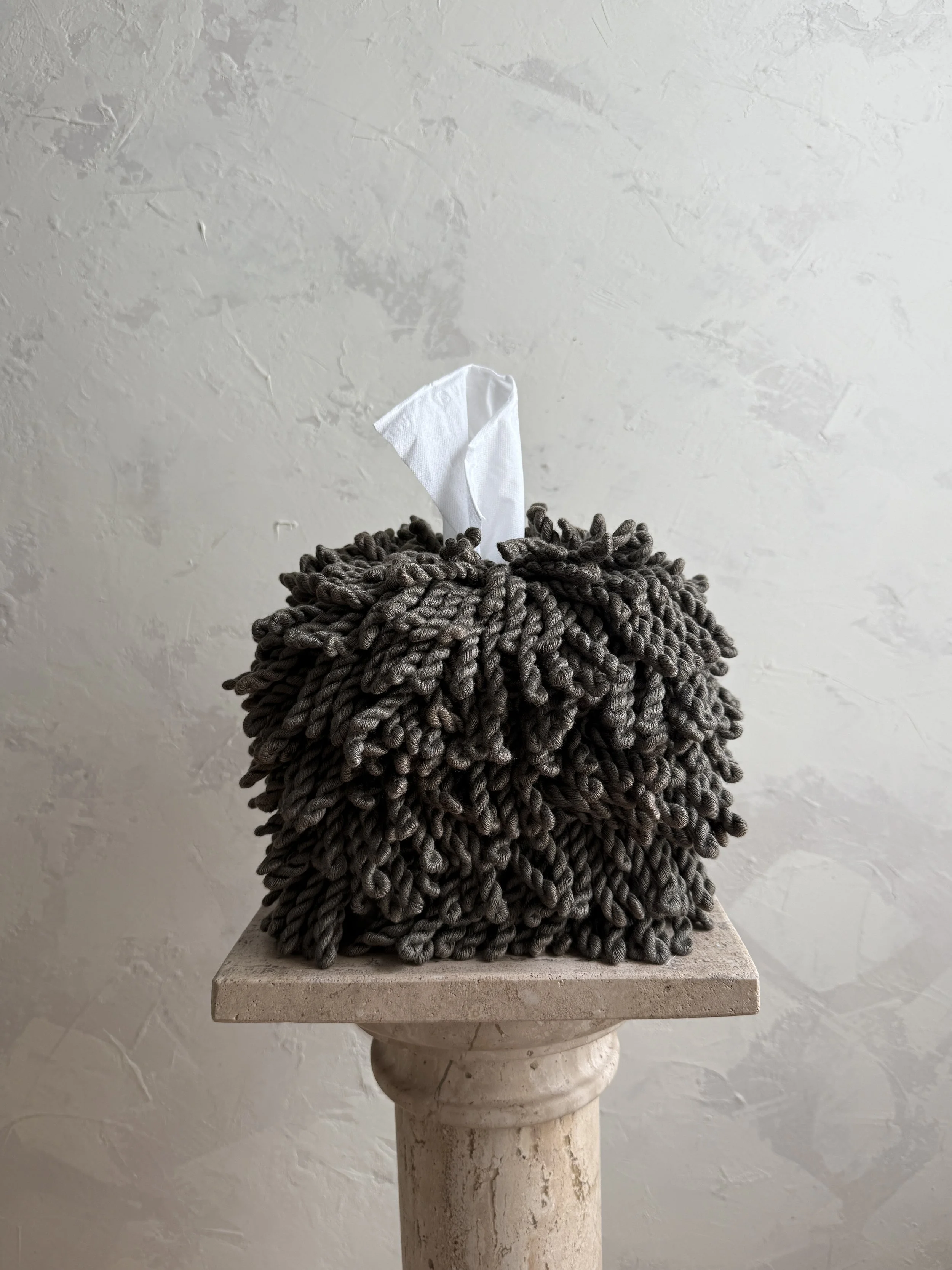 Earthy olive fringe tissue box cover designed by Amber Renee Hansen, featuring long-pile fringe and quiet luxury details.