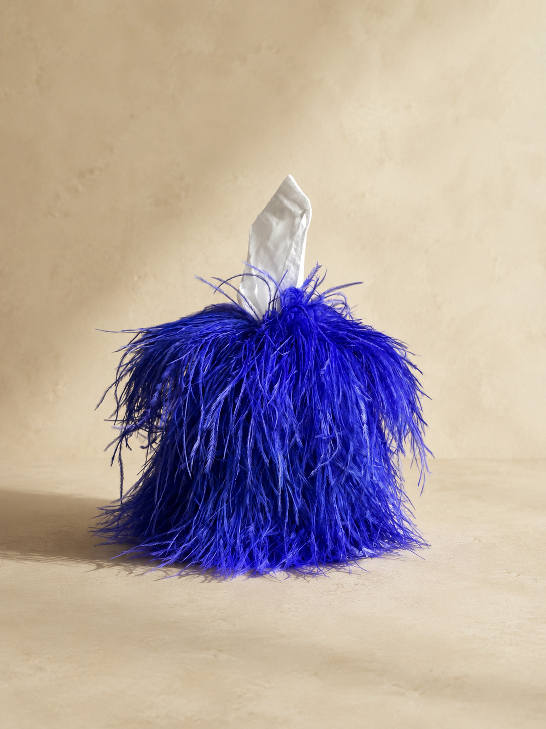 Ultramarine blue ostrich feather tissue box cover by Amber Renee Hansen, a sculptural functional design object for collected artful intreiors