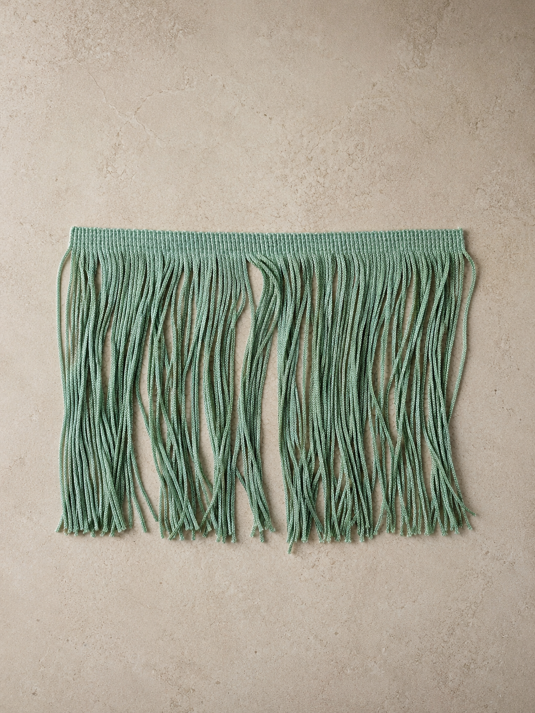 Sea Glass Spill Edit Fringe Tissue Box Cover with cascading fringe detail