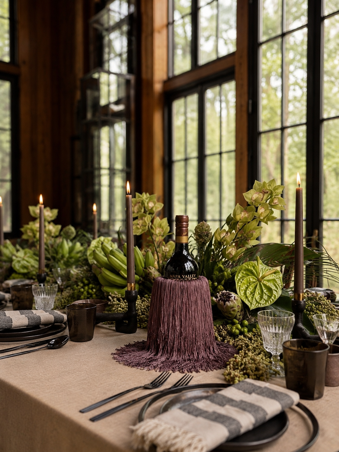 Bordeaux Noir marble wine chiller with cascading fringe, placed on a neutral tablescape.