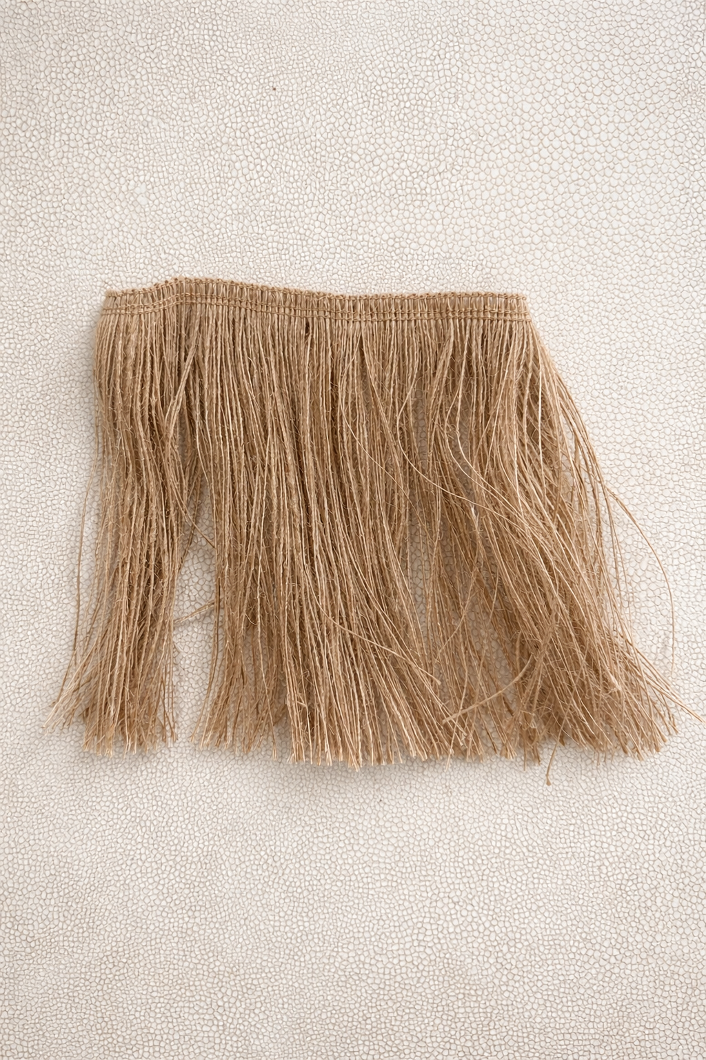 Close up of Rooted jute fringe for tissue box cover by Amber Renee Hansen