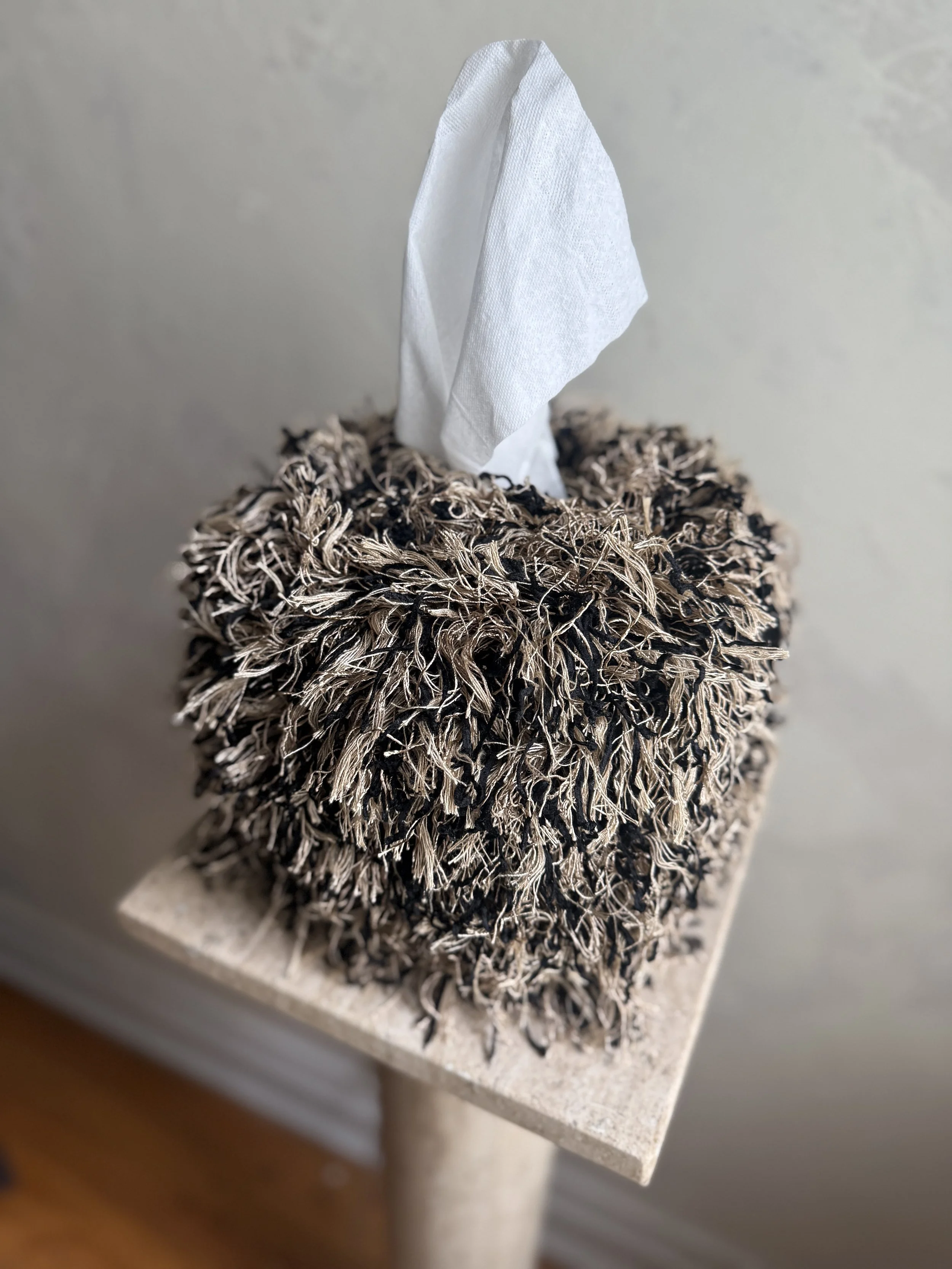 Ink & Linen Fringe Tissue Box Cover — limited-edition design with layered black and linen fringe, handcrafted by Amber Renee Hansen.