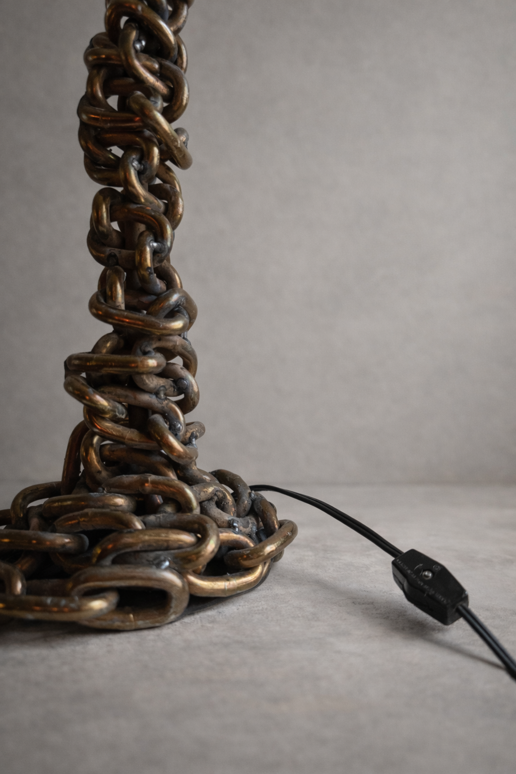 Close up of chain on Umbra Lamp by Amber Renee Hansen