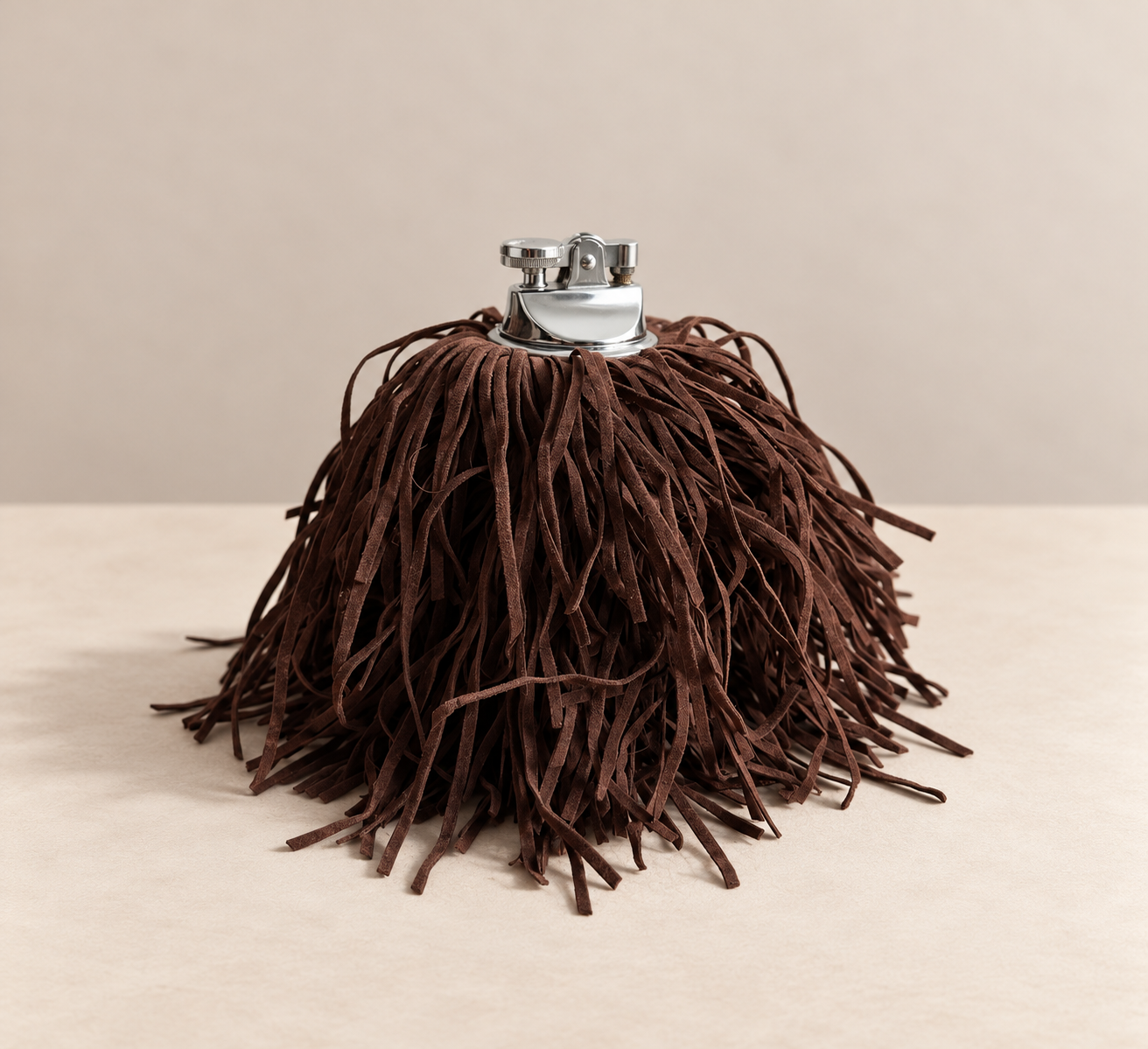 Vintage onyx lighter with aged metal hardware and cascading espresso brown fringe, reinvigorated as a one-of-a-kind decorative object by Amber Renee Hansen.