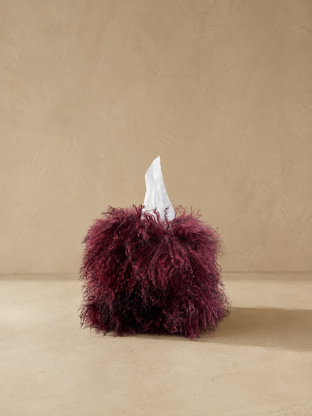 Mulberry Reserve Mongolian Lamb Tissue Box Cover in a deep wine-inspired mulberry hue with luxurious curly fleece.