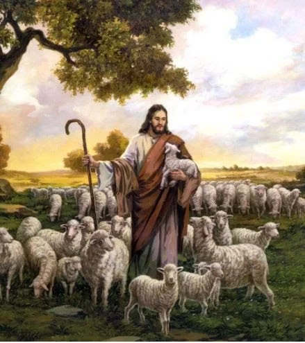 Jesus in a field with His flock of sheep.