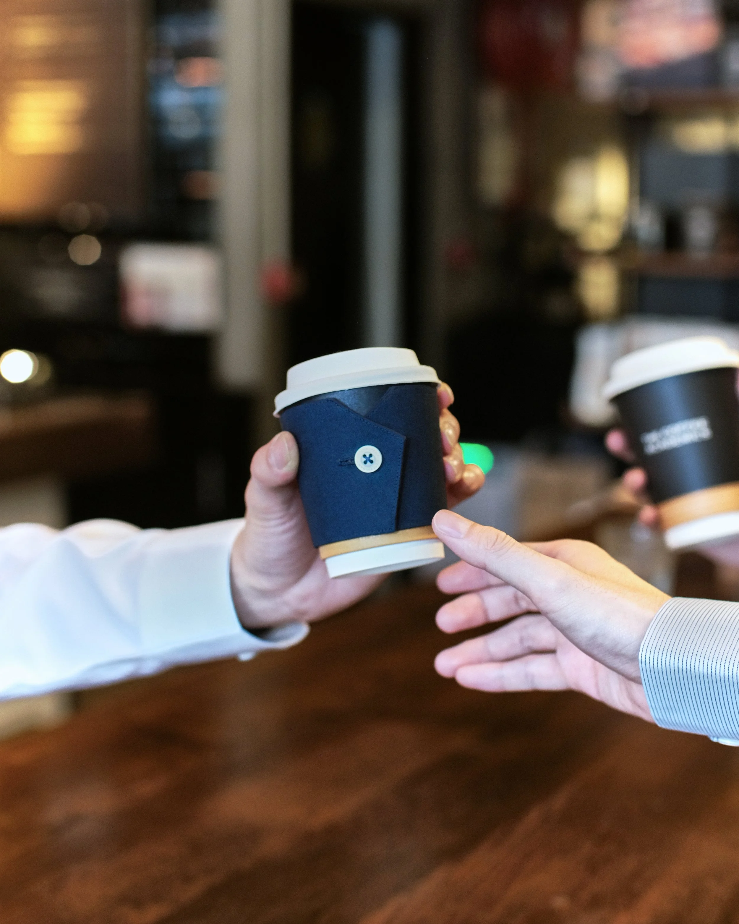 DETxTCA Coffee Sleeve-1.jpg