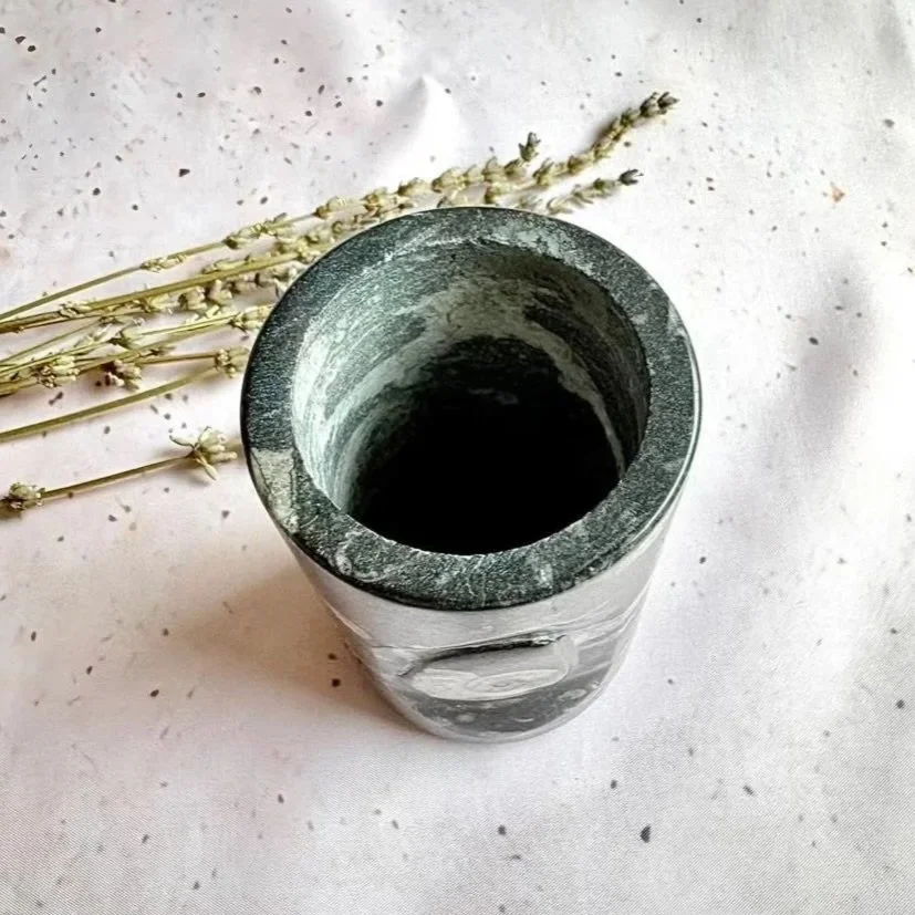 Polished Orthoceras Fossil Vase handcrafted from natural fossil stone, featuring ancient marine fossils preserved in stone, approximately 10 cm tall.