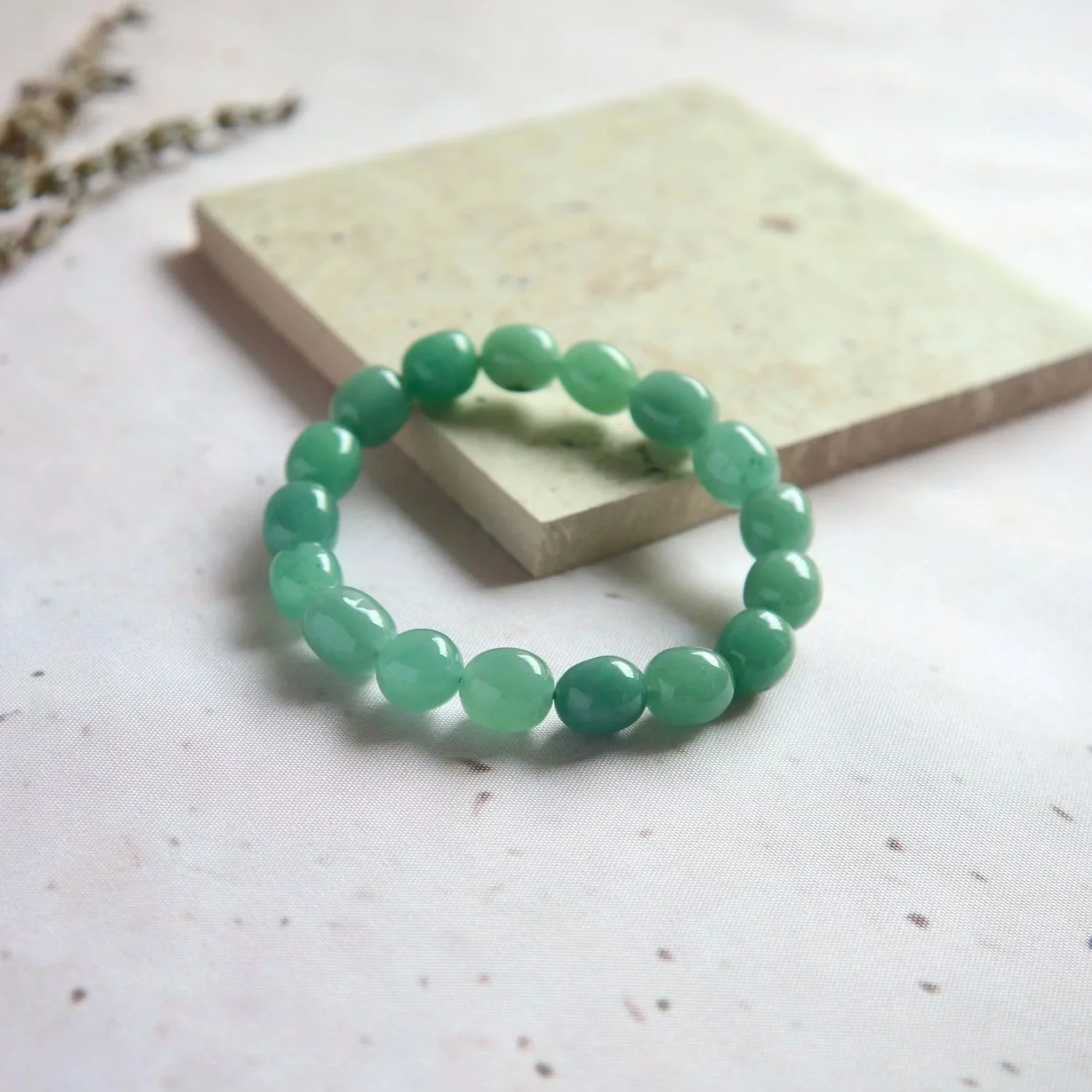Green Aventurine tumble bracelet with earthy green tones and natural stone patterns
