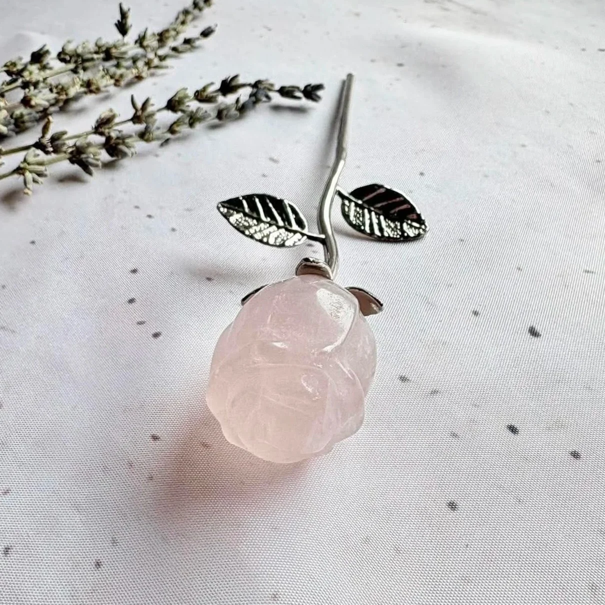 Rose Quartz crystal rose with a silver stem and leaf detail