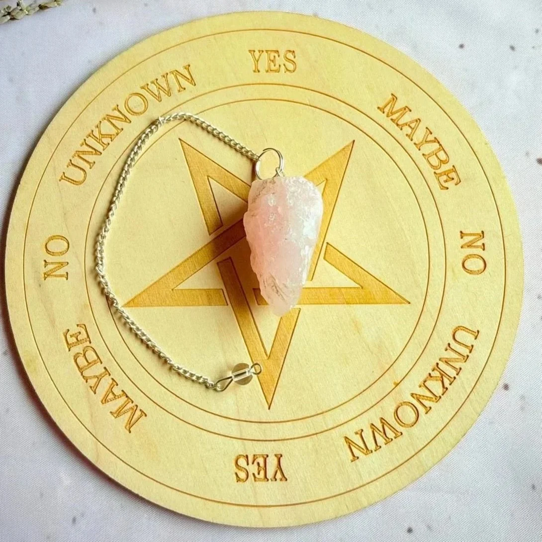 Natural rough Rose Quartz crystal pendulum with silver-coloured chain