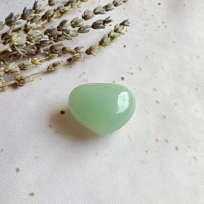Polished Green Aventurine crystal puff heart displaying natural green colouring