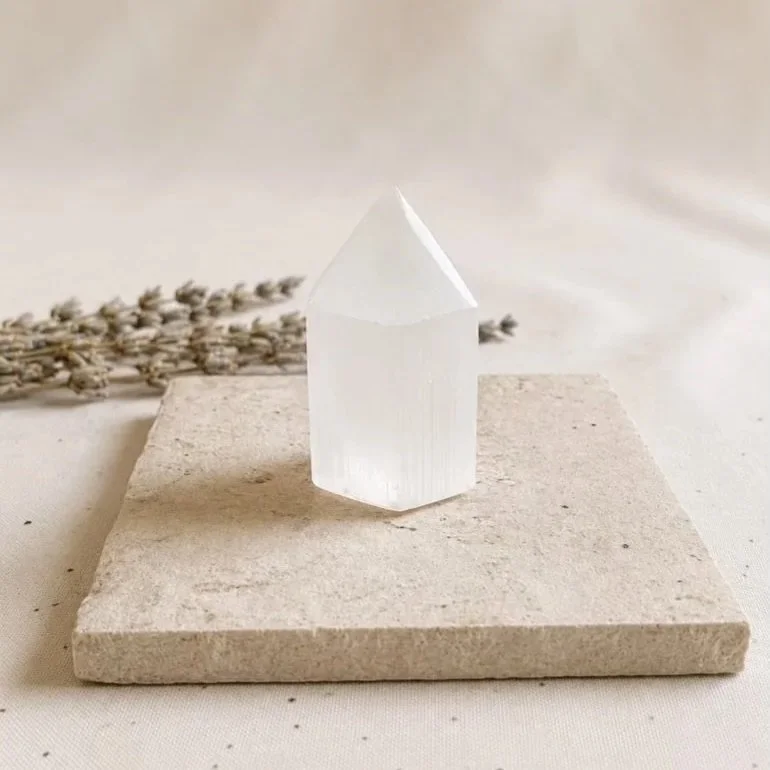 Natural Satin Spar crystal tower measuring approximately 6cm tall with a silky white appearance