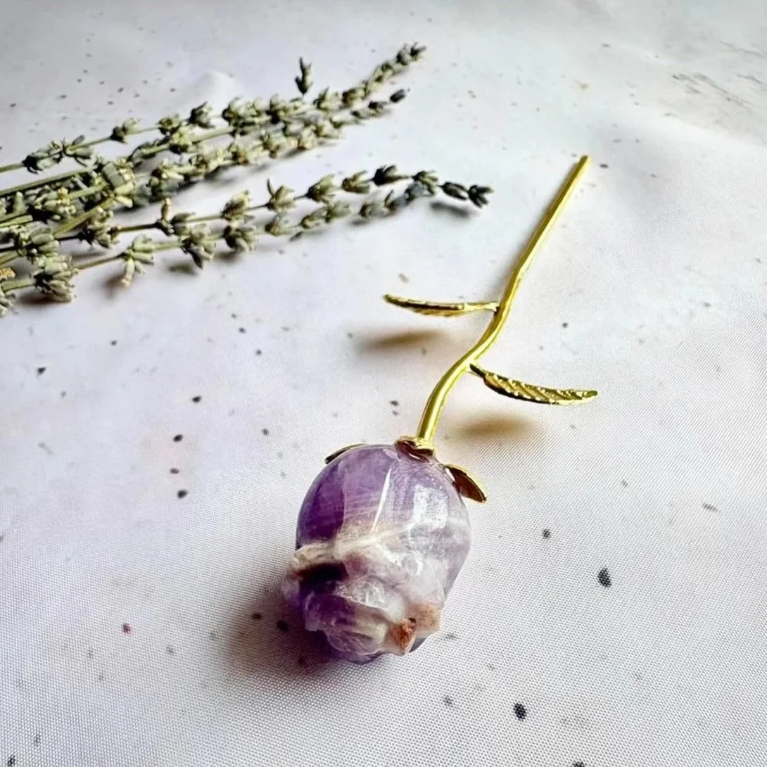Amethyst crystal rose with gold coloured stem measuring approximately 16cm tall