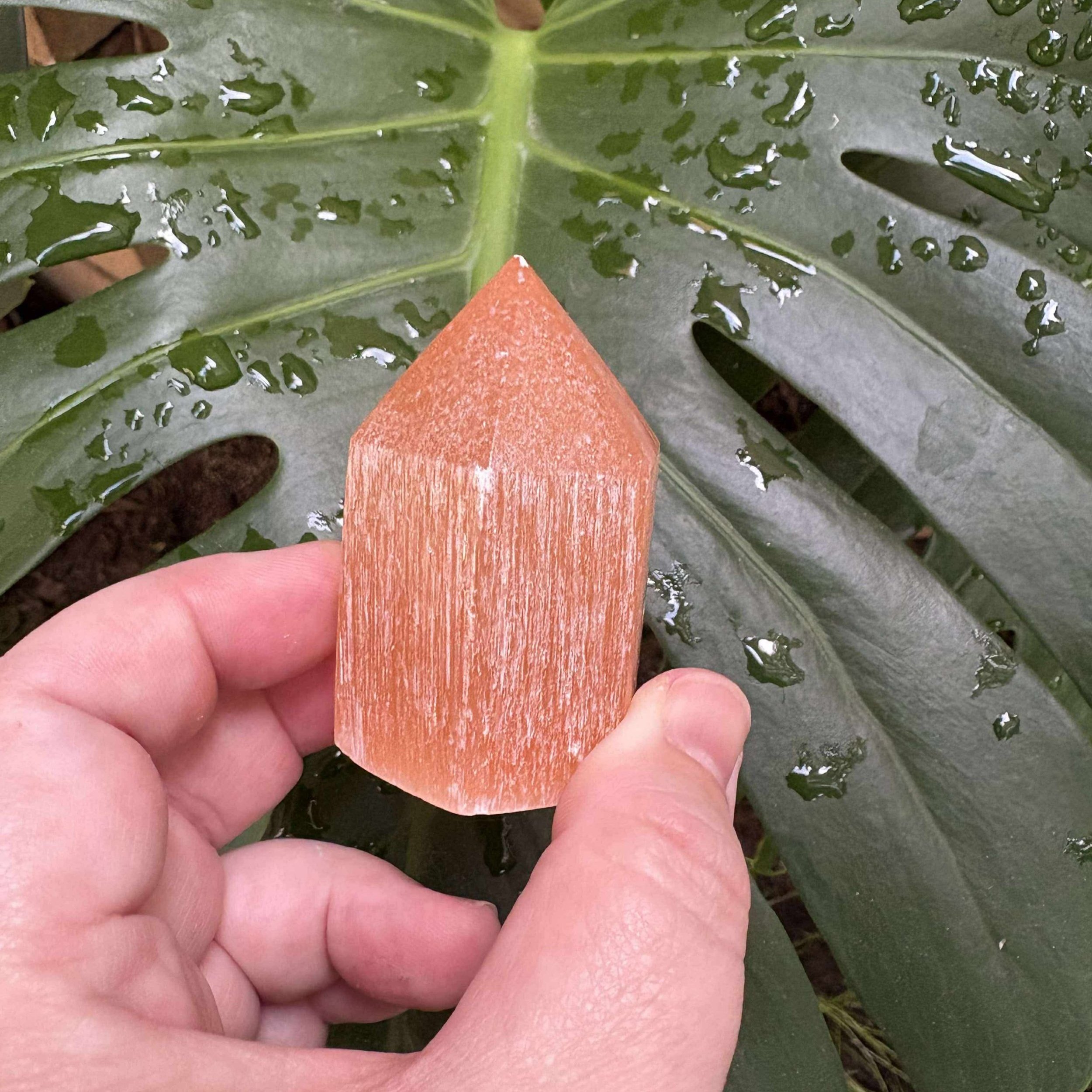 Warm peach-hued Satin Spar tower, perfect for energy clearing and emotional support