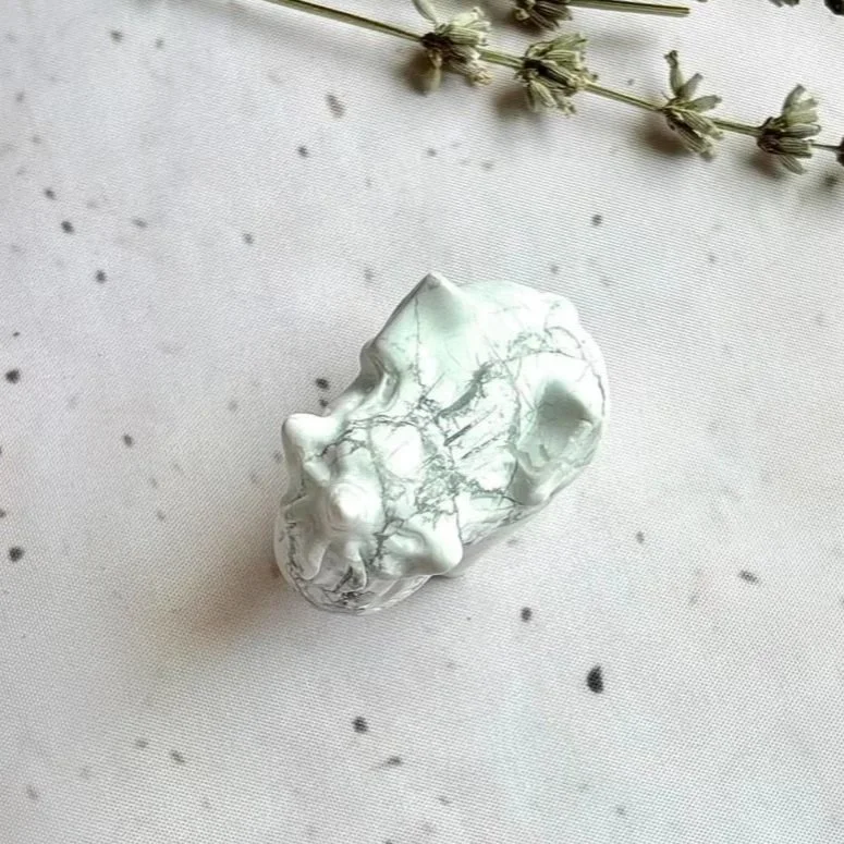 Howlite Pegasus crystal carving associated with calm, hope, and inspiration