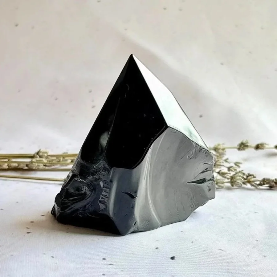 Black Obsidian polished point measuring approximately 9cm tall