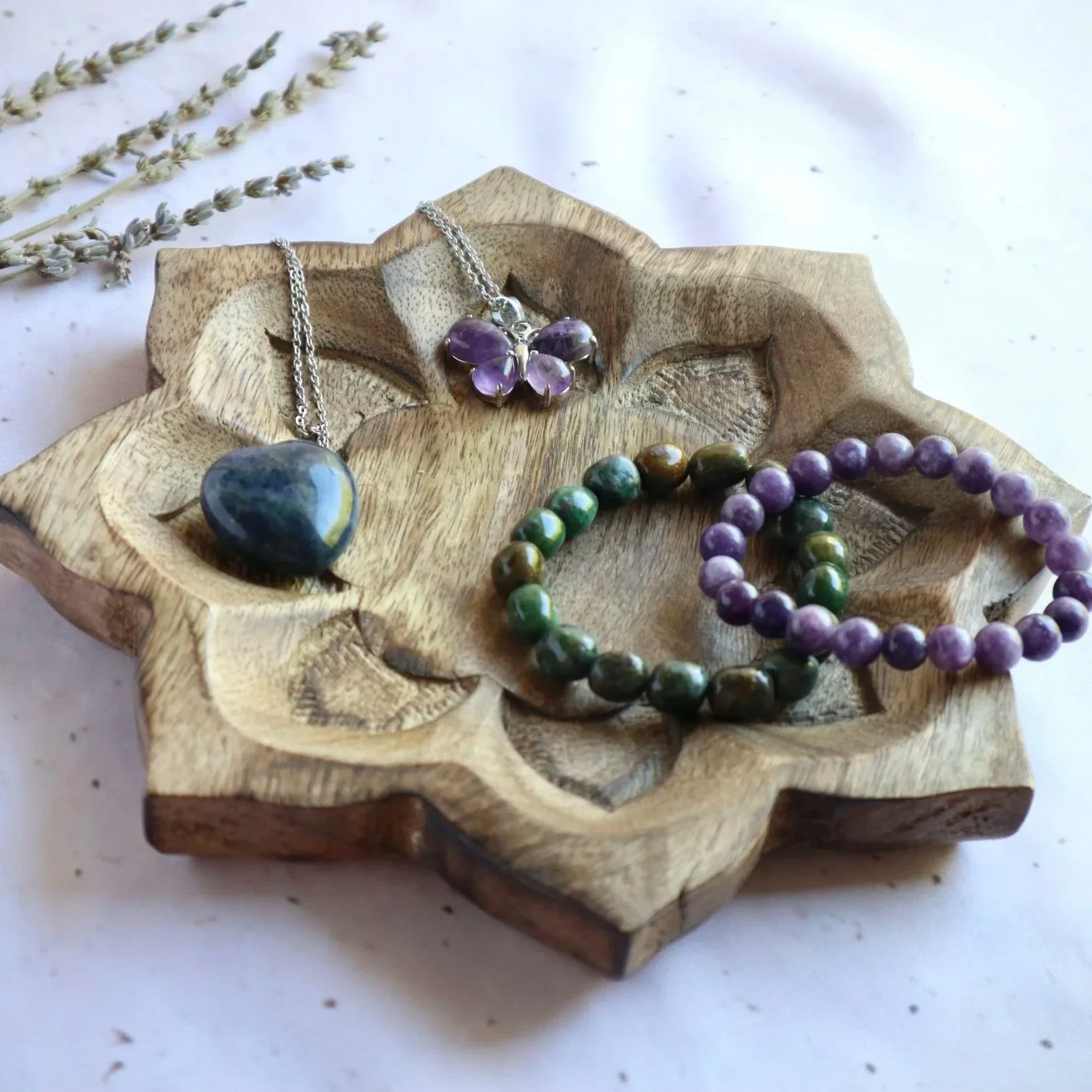 Carved wooden lotus display tray for showcasing crystals, jewellery and keepsakes.