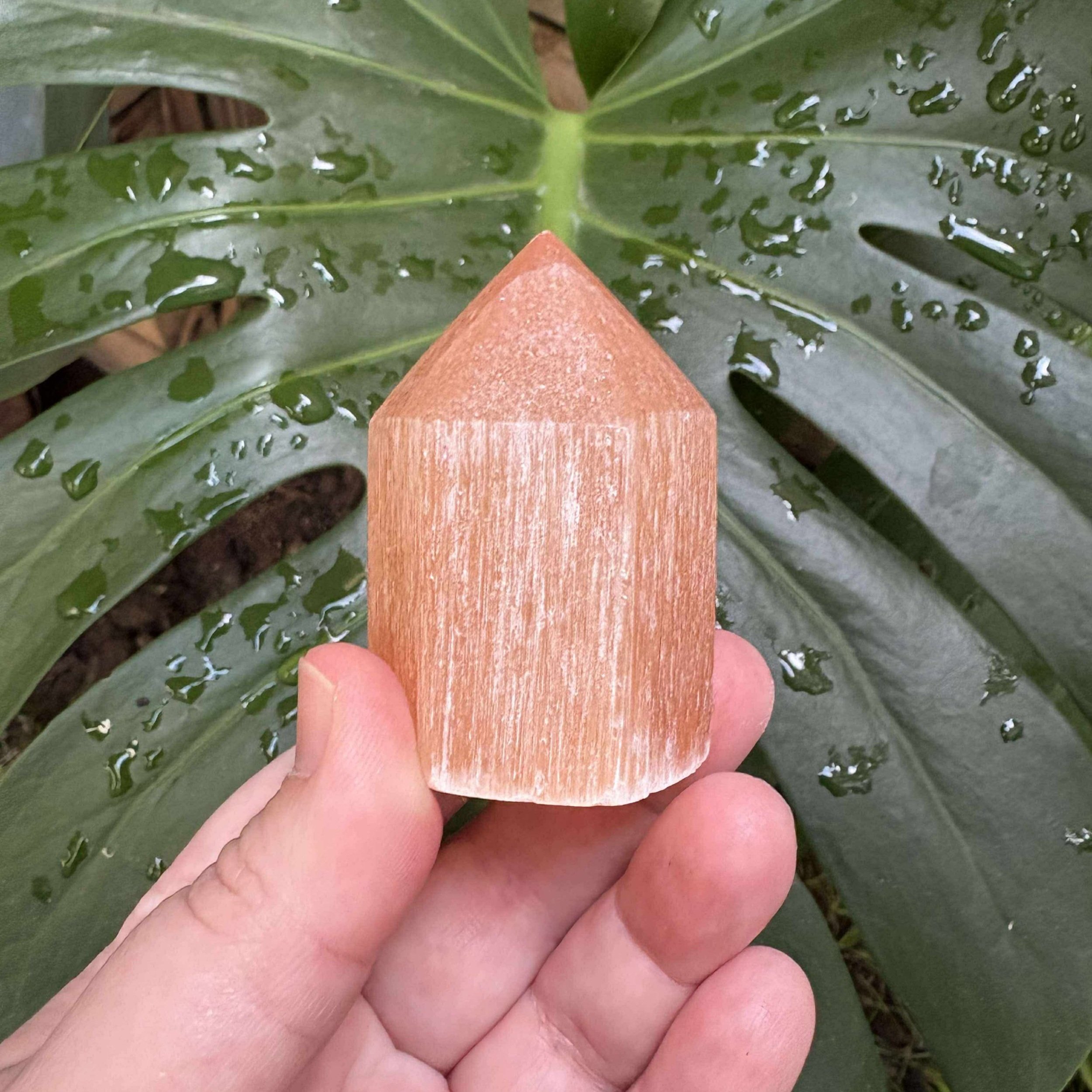 6cm Peach Satin Spar crystal tower from Sunflower Hollows, warm-toned stone for emotional healing, grounding, and gentle energy cleansing