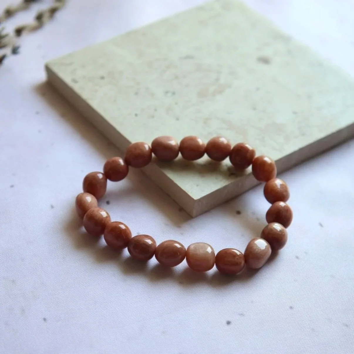 Warm-toned Orange Moonstone tumble bead bracelet for everyday crystal jewellery.