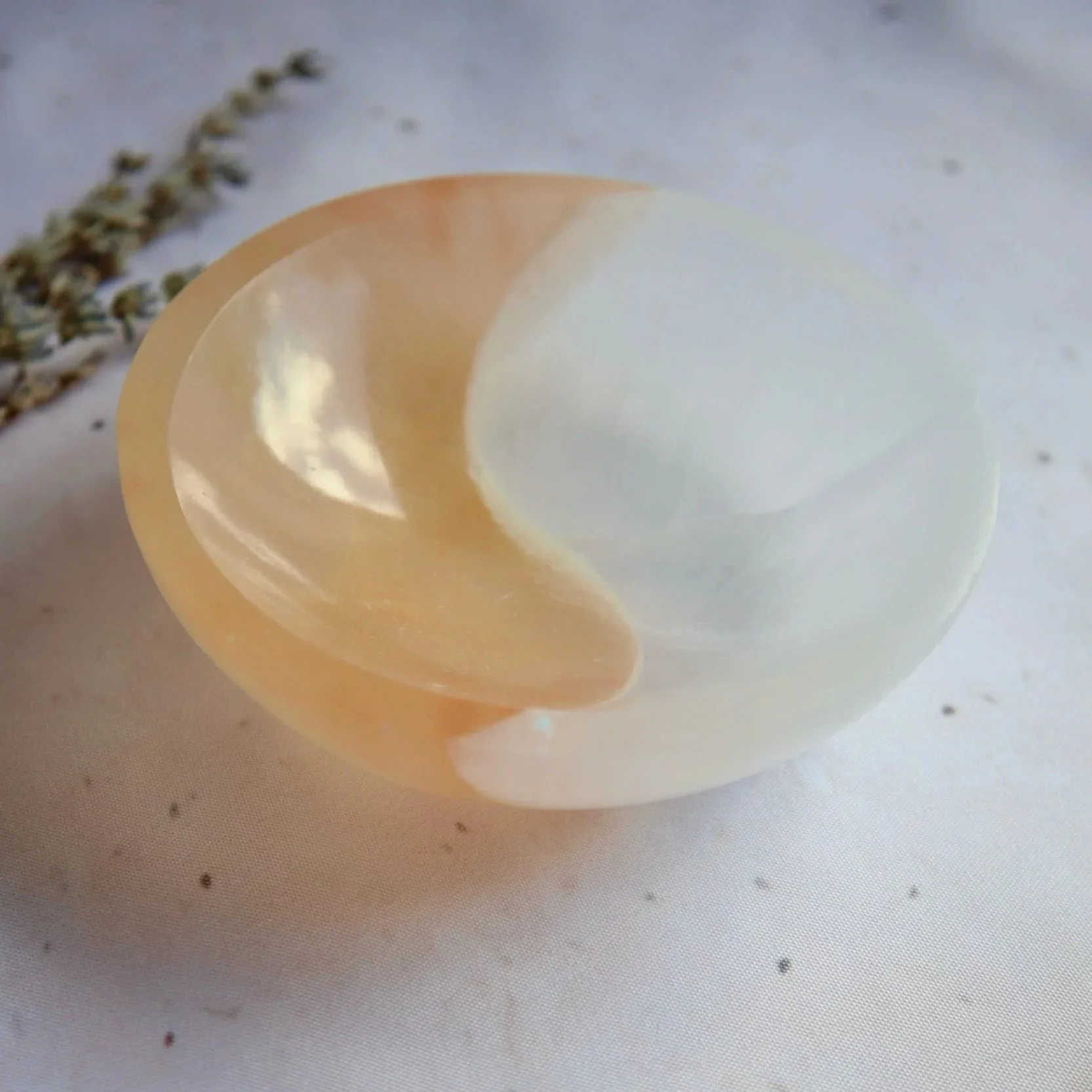 Natural Satin Spar round bowl with soft peach and white colouring and silky fibrous texture