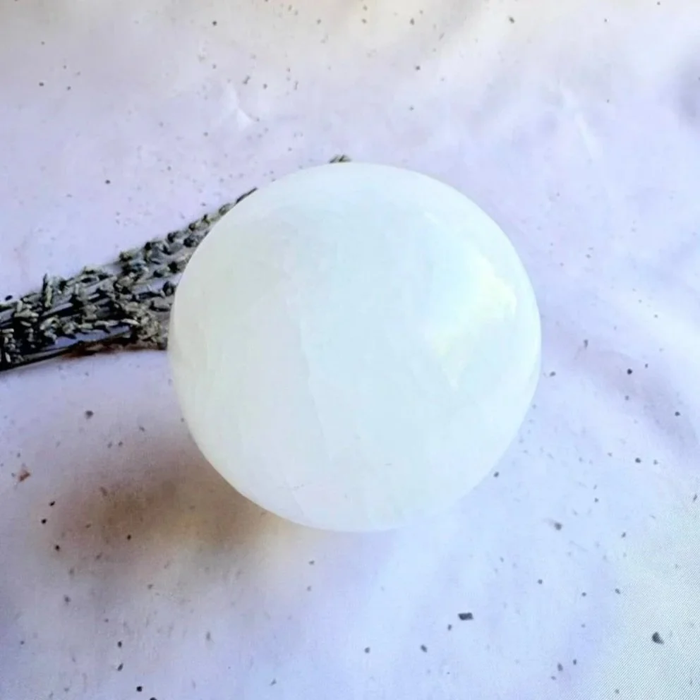 Satin Spar crystal sphere commonly sold as Selenite with a silky luminous glow