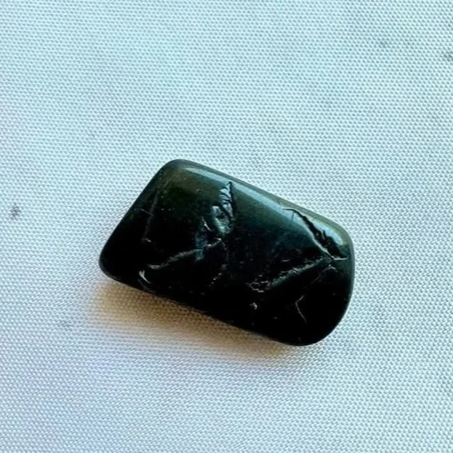 Natural Black Tourmaline tumble with polished finish and deep black colouring