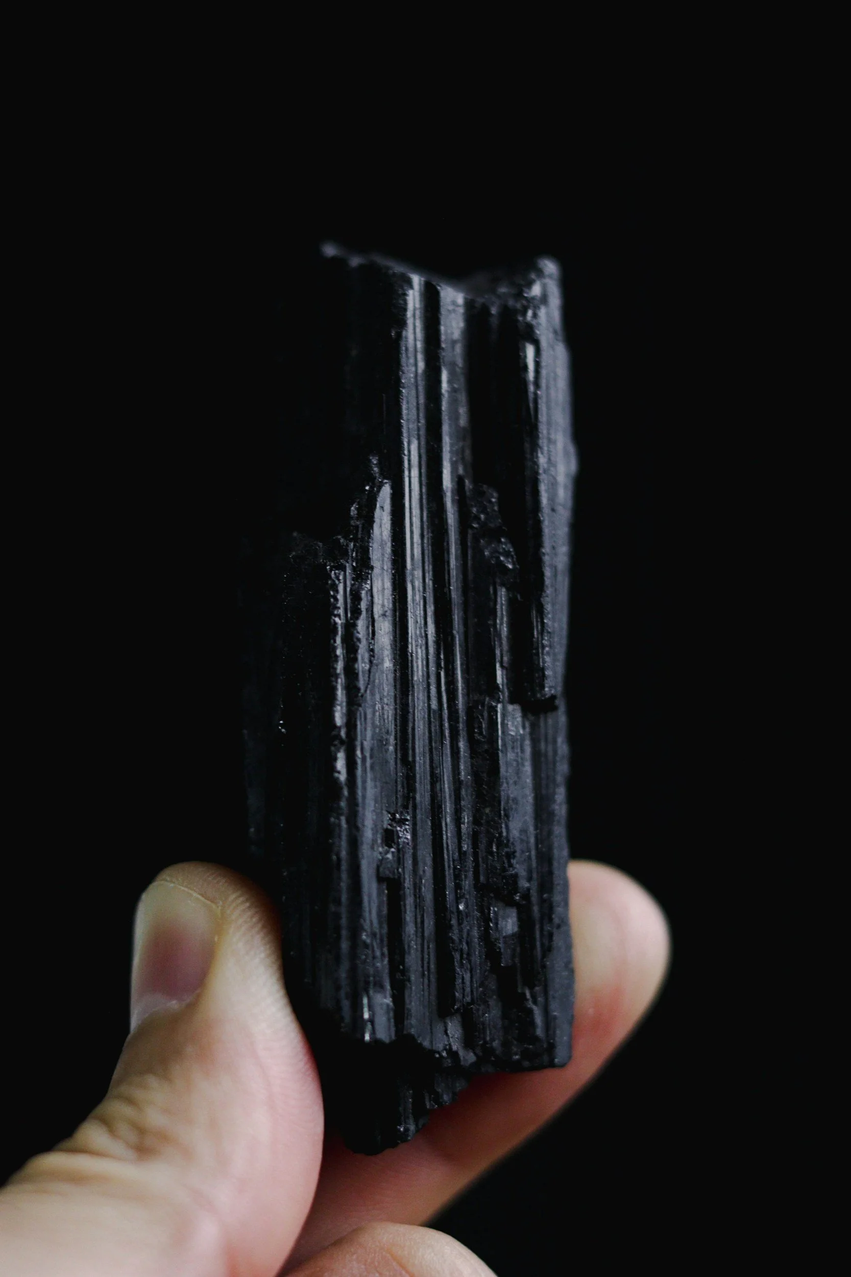 Black Tourmaline crystal, traditionally associated with the Root Chakra