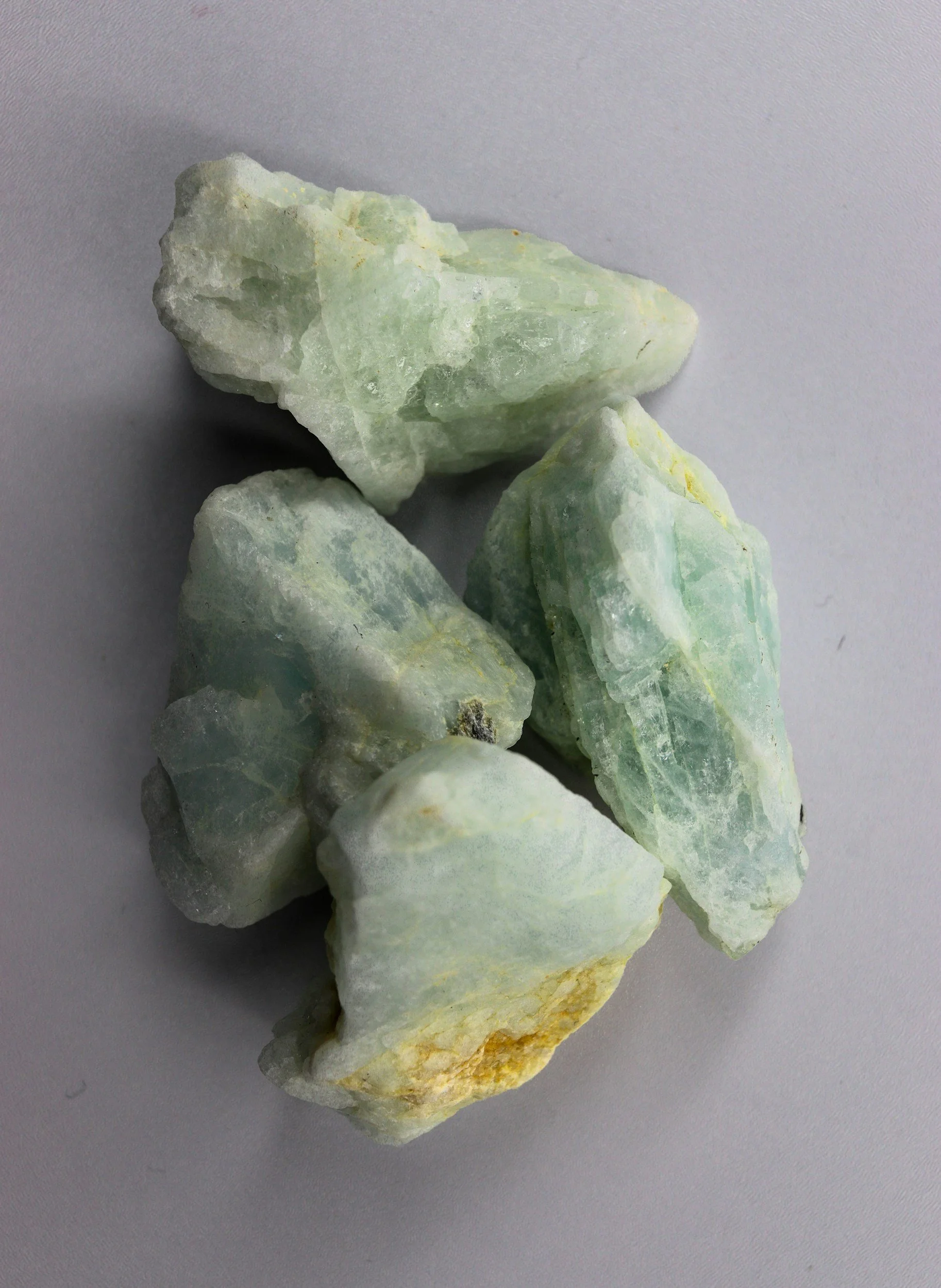 Natural Amazonite crystals, traditionally associated with the Throat Chakra